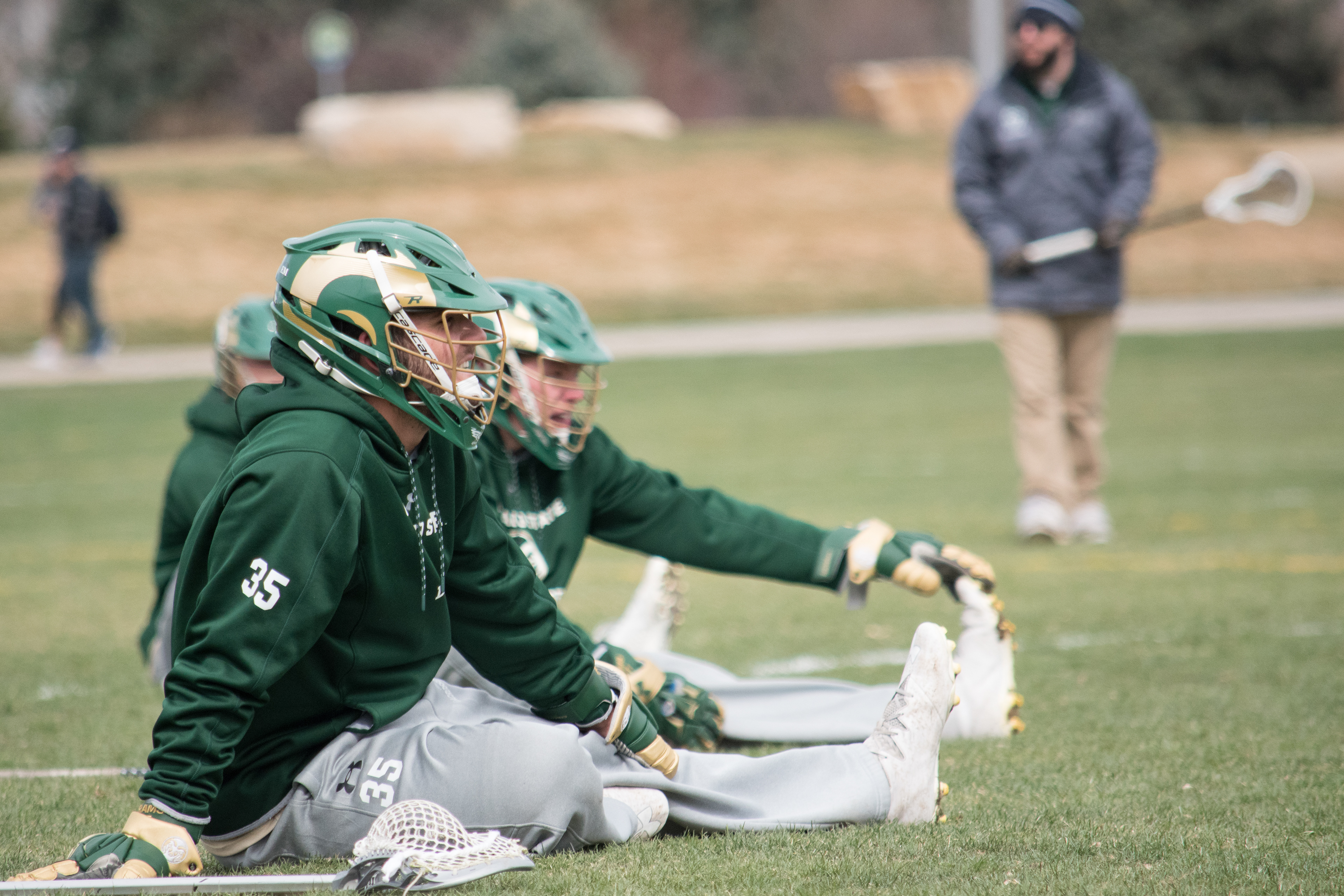 The Colorado State University lacrosse team warms up before a game on the IM fields, March 29, 2018.
