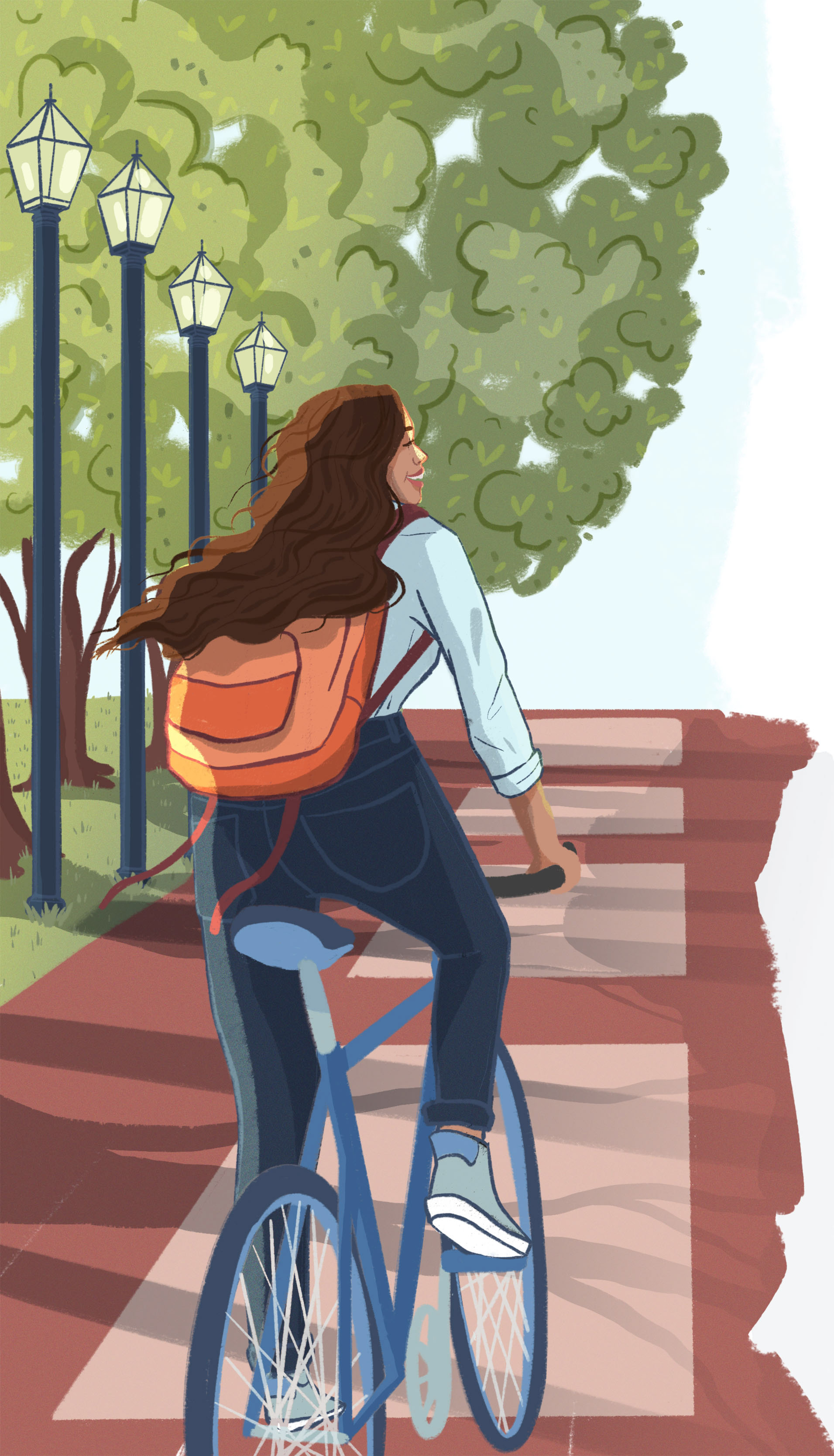 Woman riding her bicycle freely on university campus