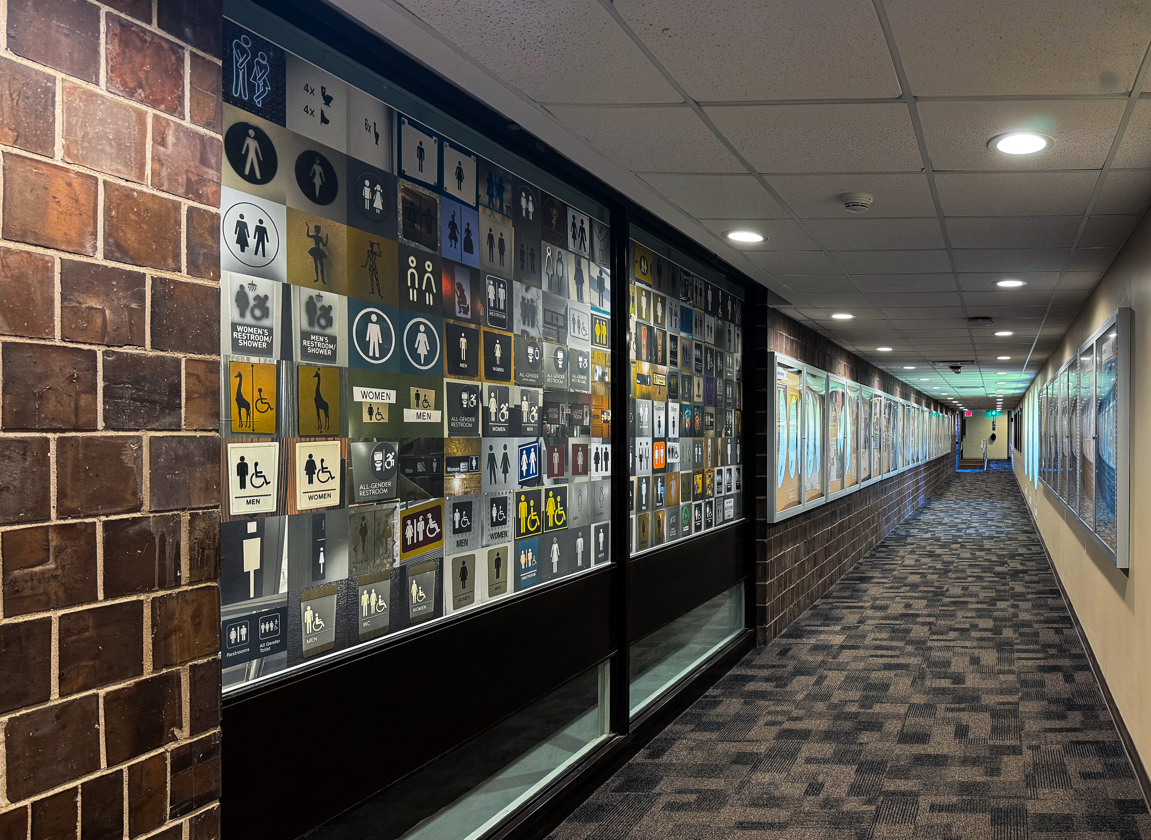 Hallway view of photo installation.