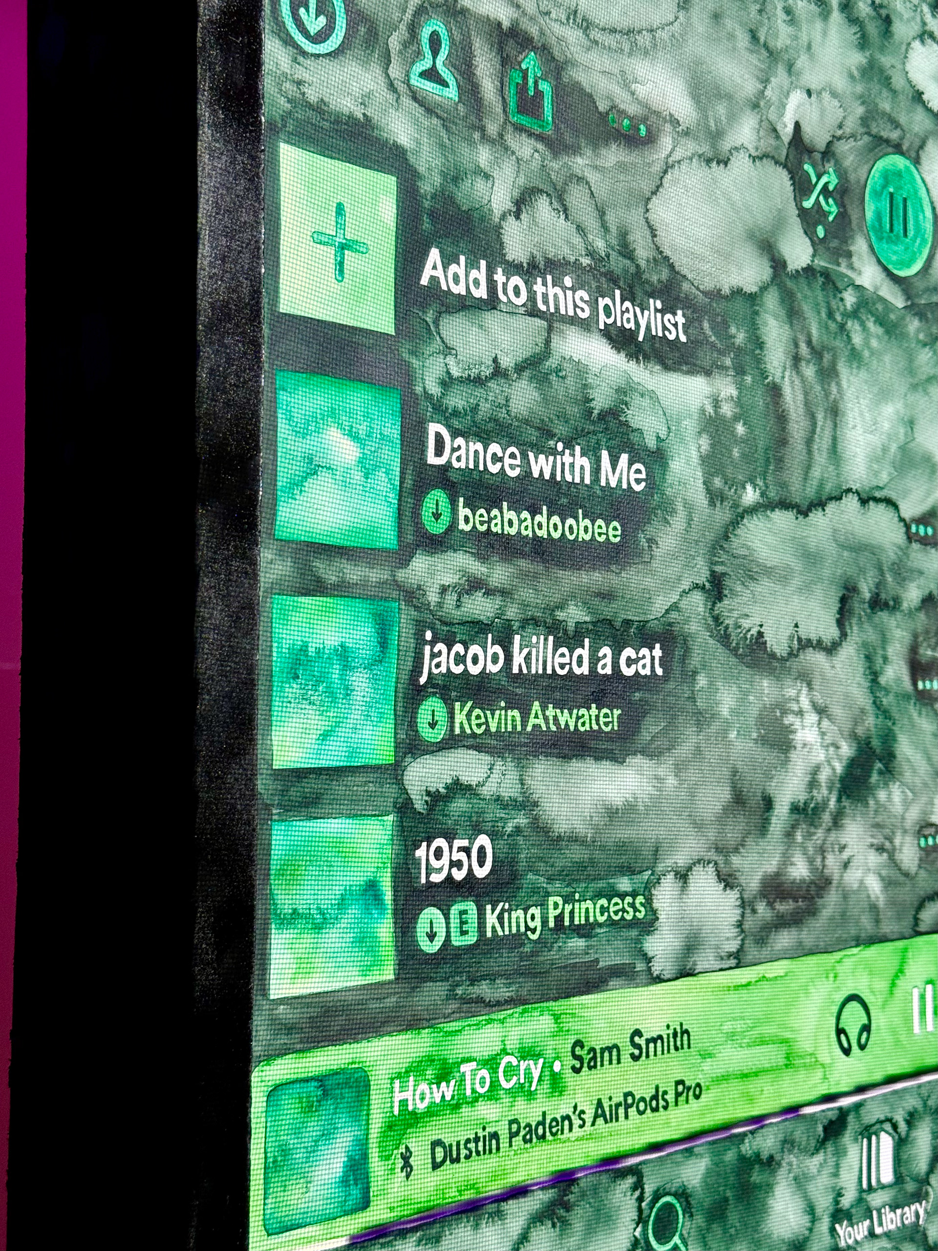 Closeup detail of green watercolor playlist. Note: there isn't alt text for the 2 videos below, they are orange screenshots of group chat texts.