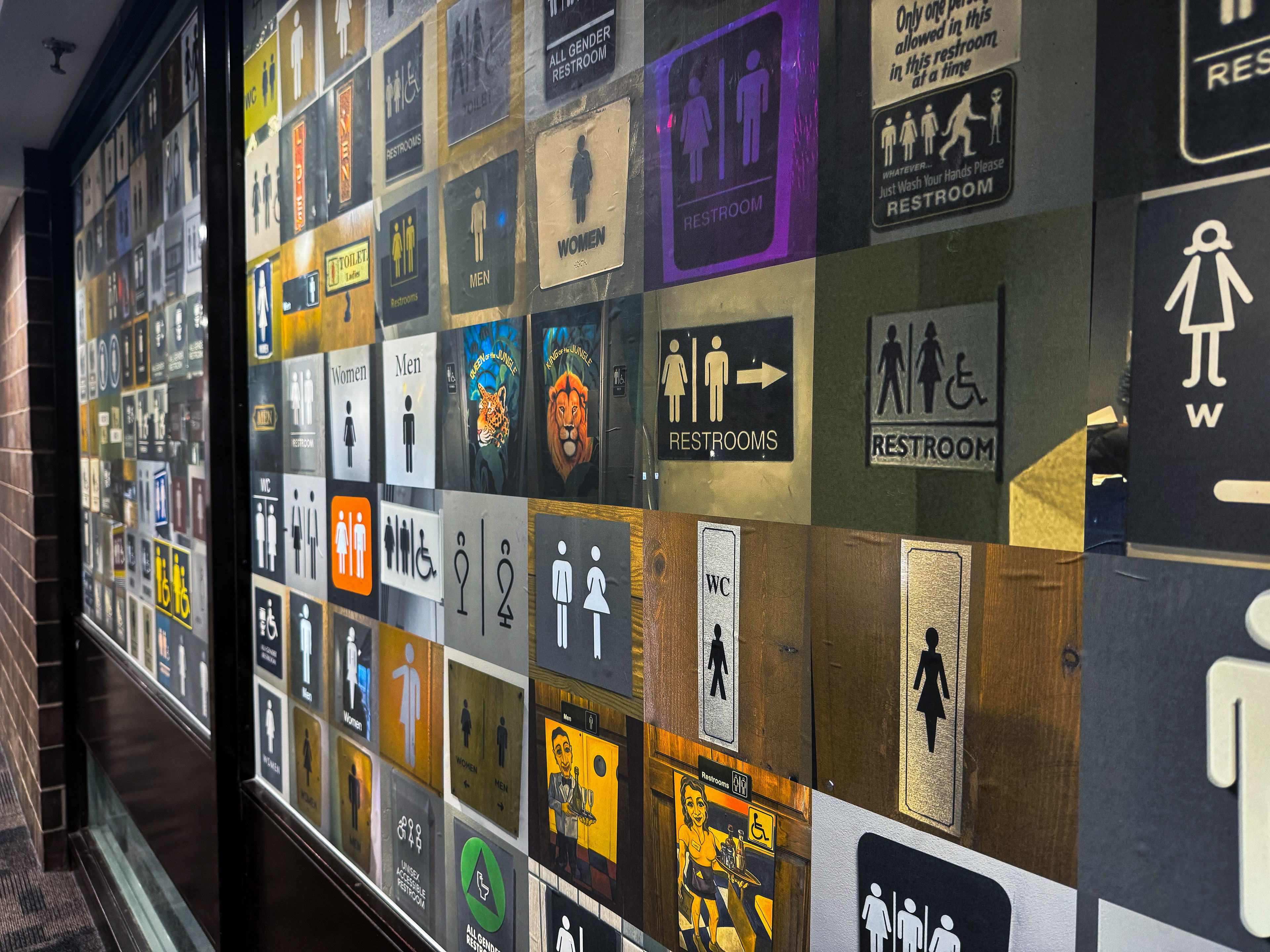 Hallway view of photo installation.