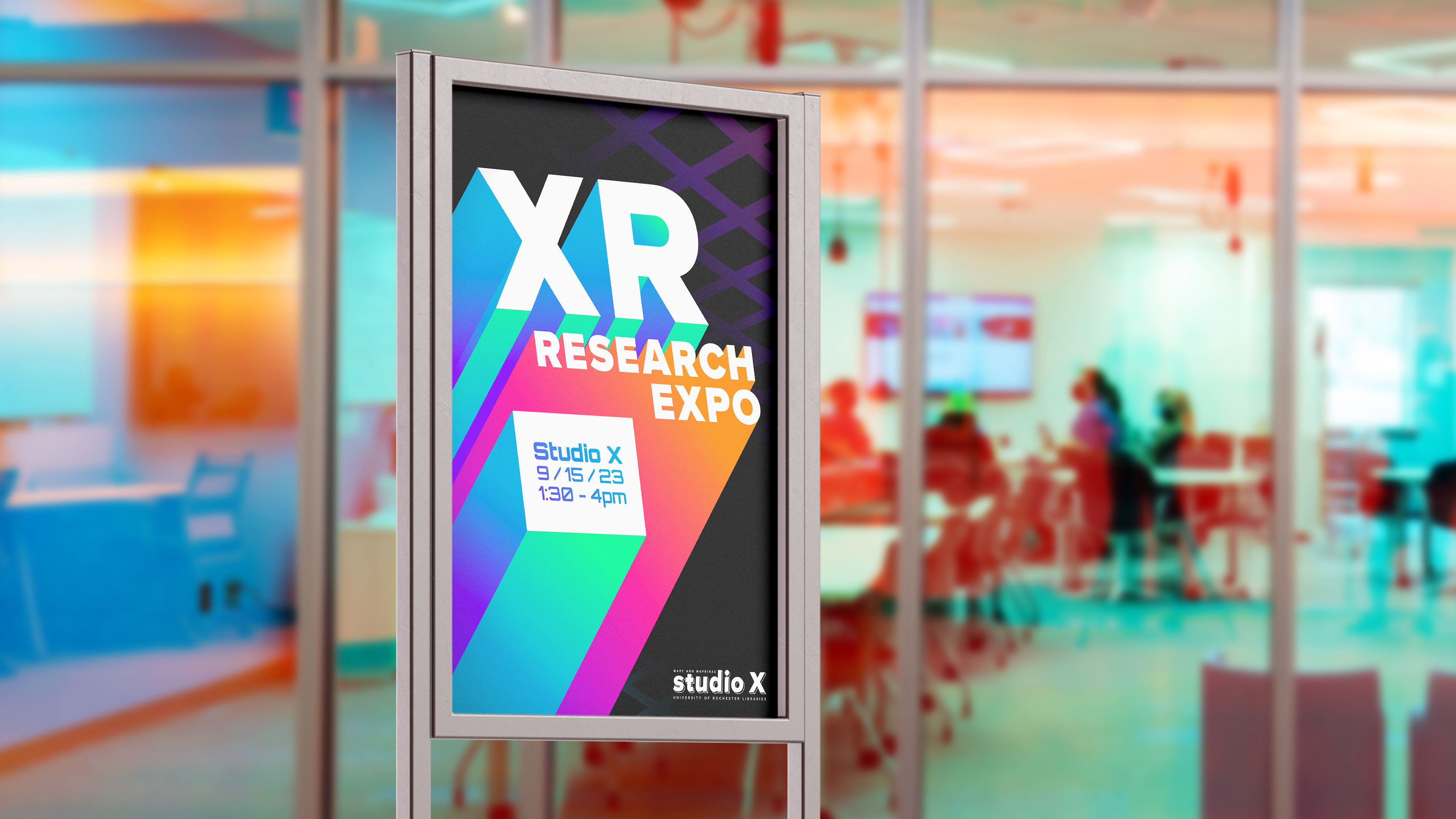 XR Research Expo poster mockup in front of Studio X's glass entrance