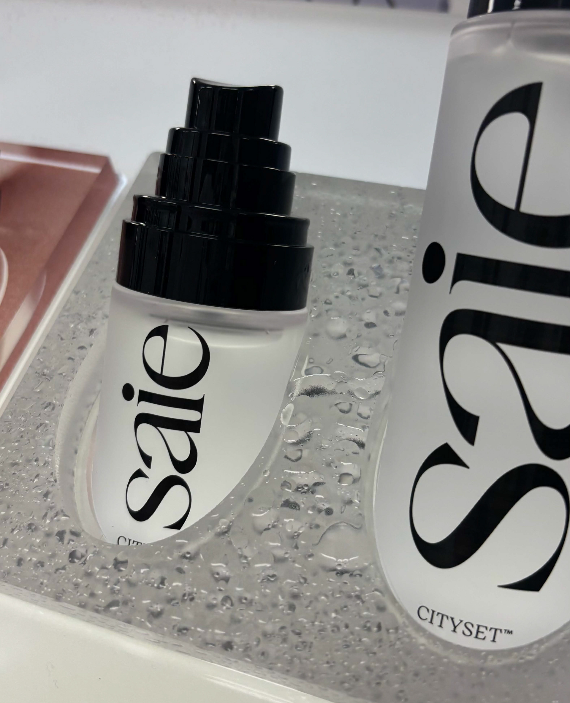 Wet look for Saie setting spray launch