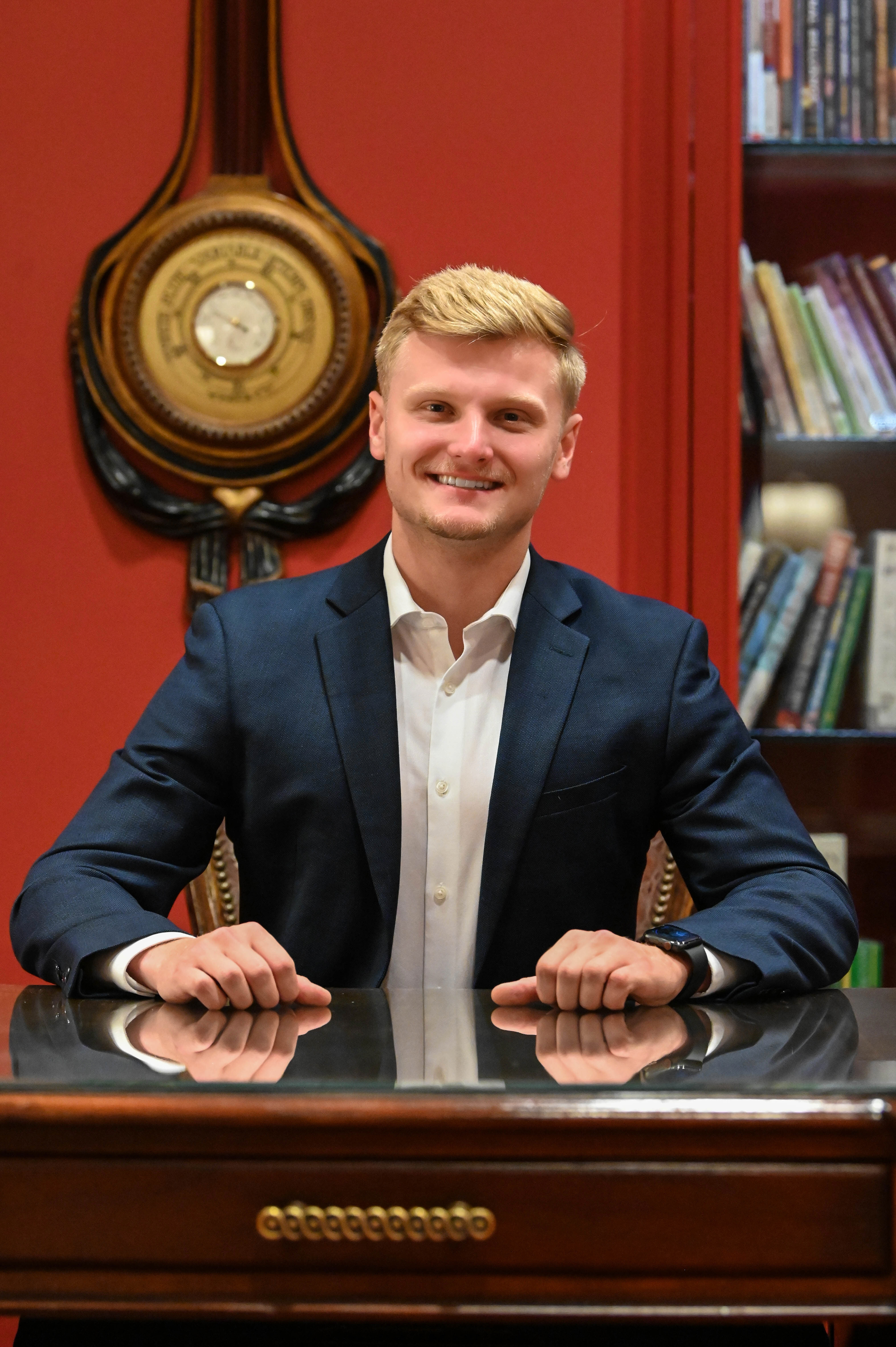 A young business professional at his desk