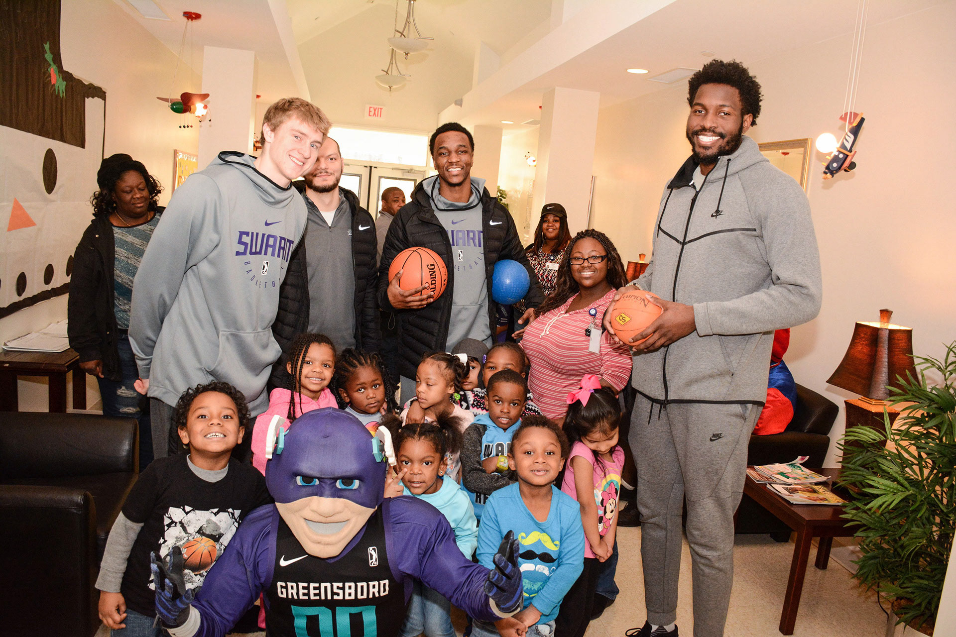 JP Macara and teammates meeting with local kids