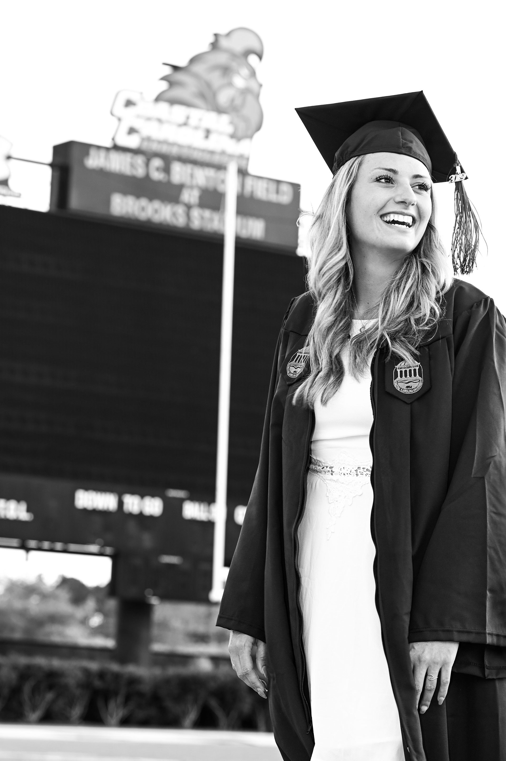 Coastal Carolina graduate on the football field
