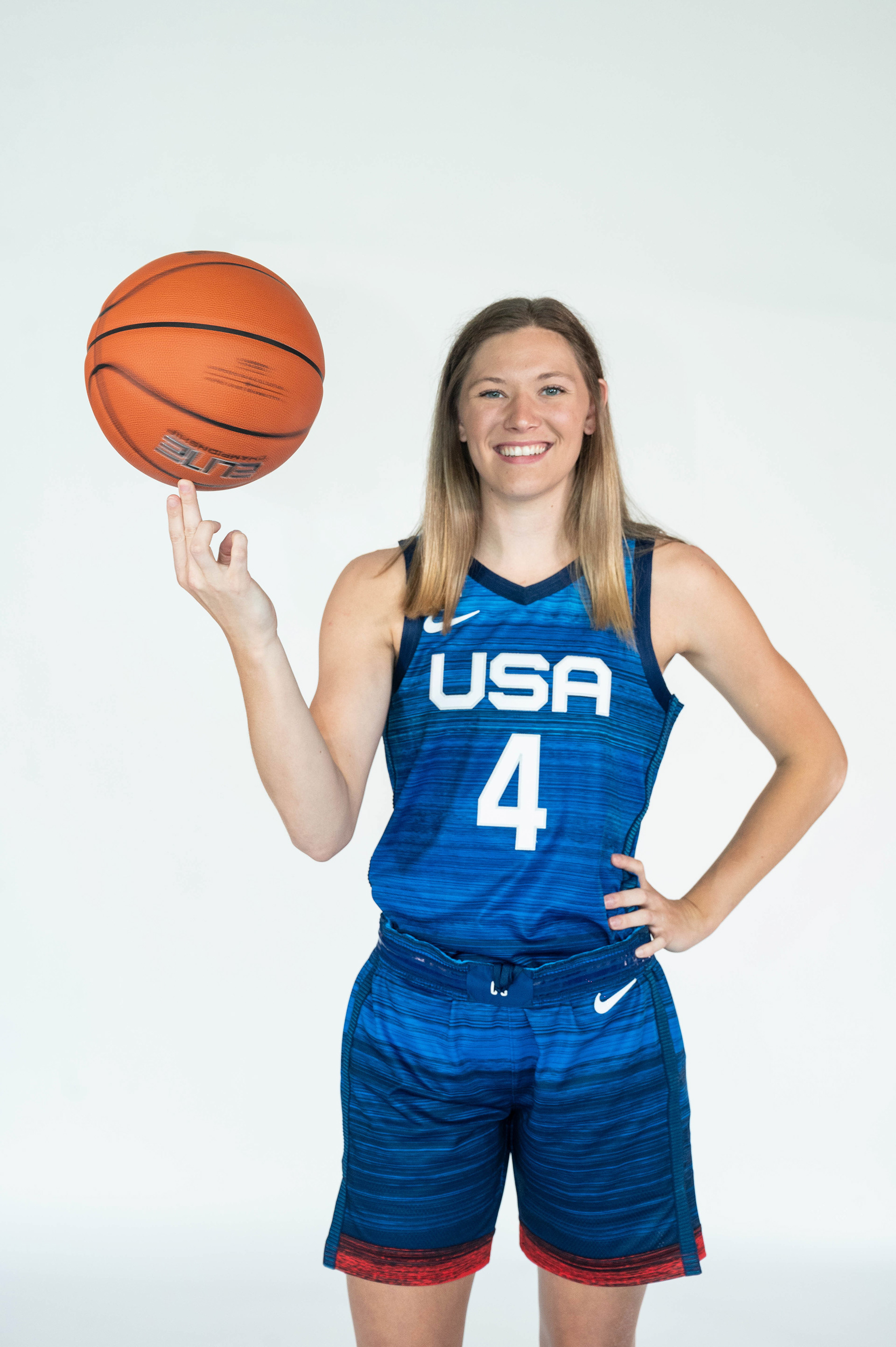 Player spinning a ball on her finger
