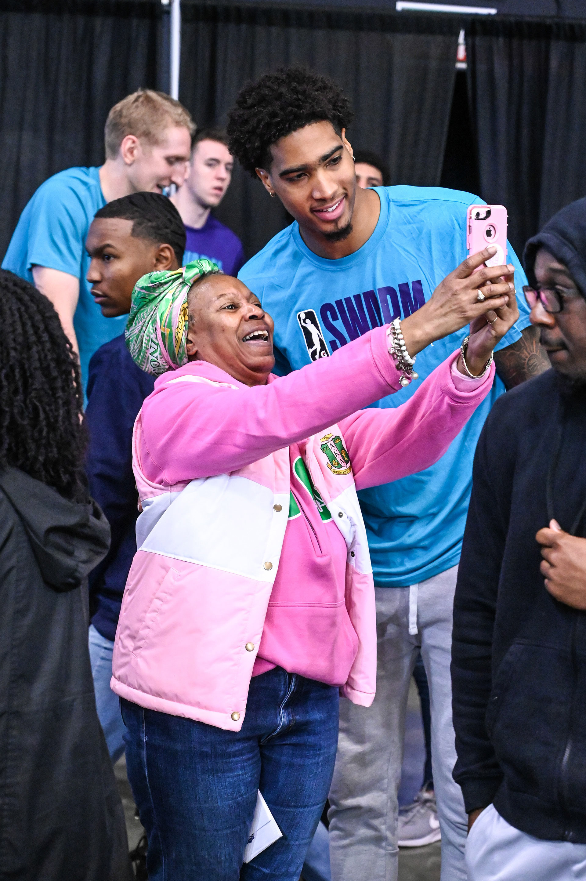 Ray Spalding taking pictures with fans