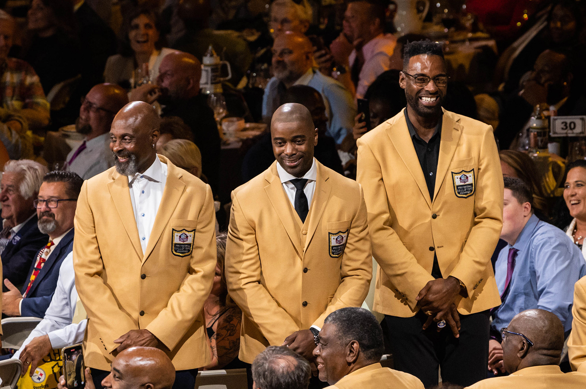 Jerry Rice, Chris Carter, and Calvin Johnshon enjoying a moment together