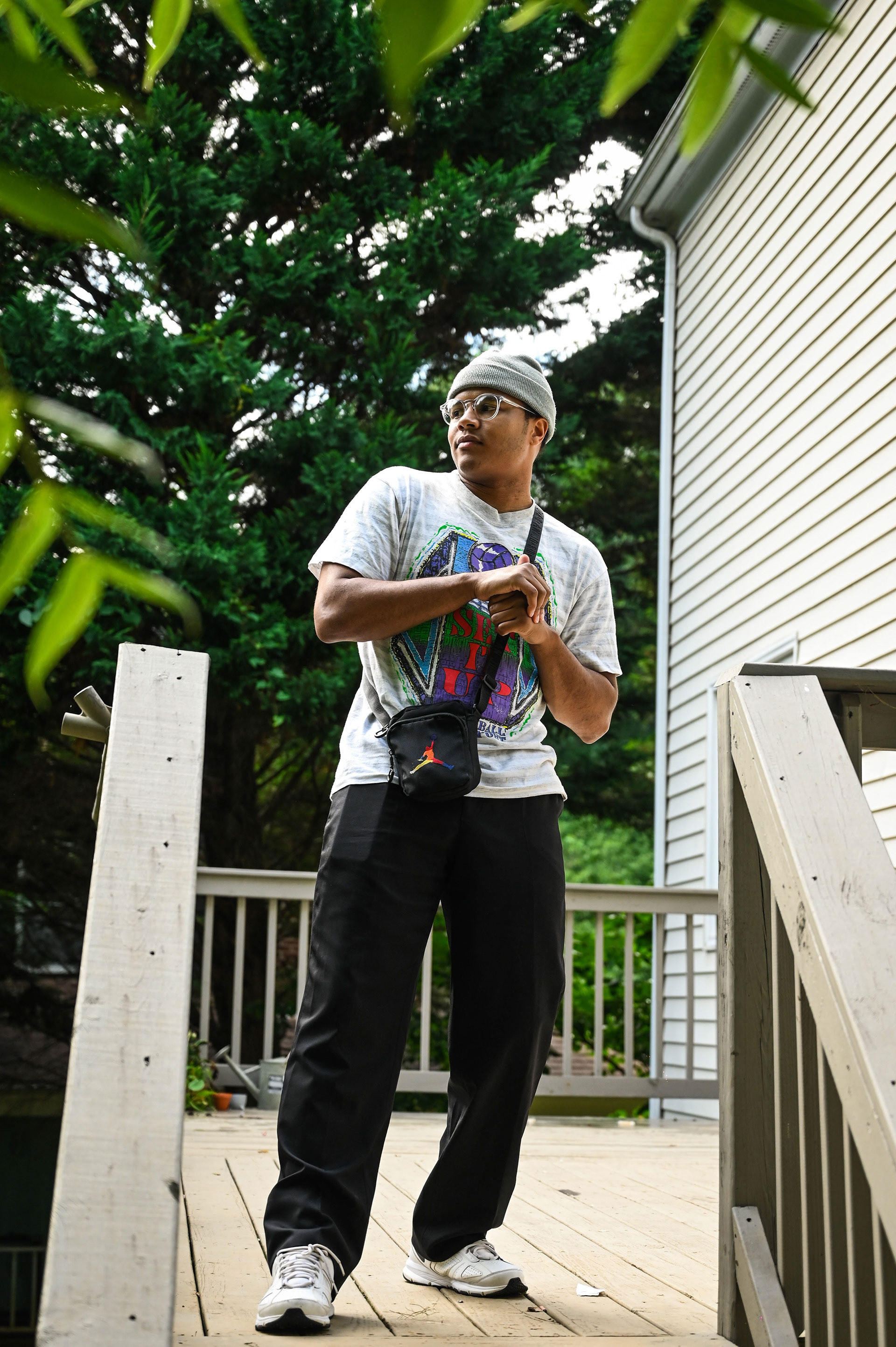 Singer showing off his new clothes for a photoshoot