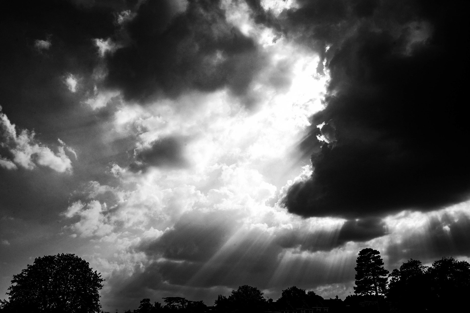 The sun breaking through the clouds in Wimbledon England