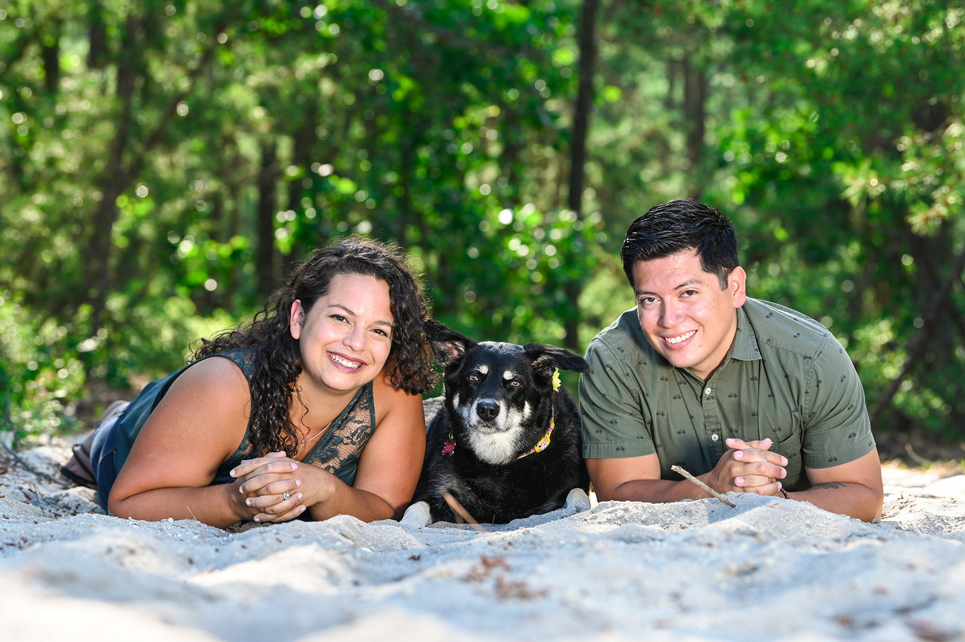A family posing and smiling together