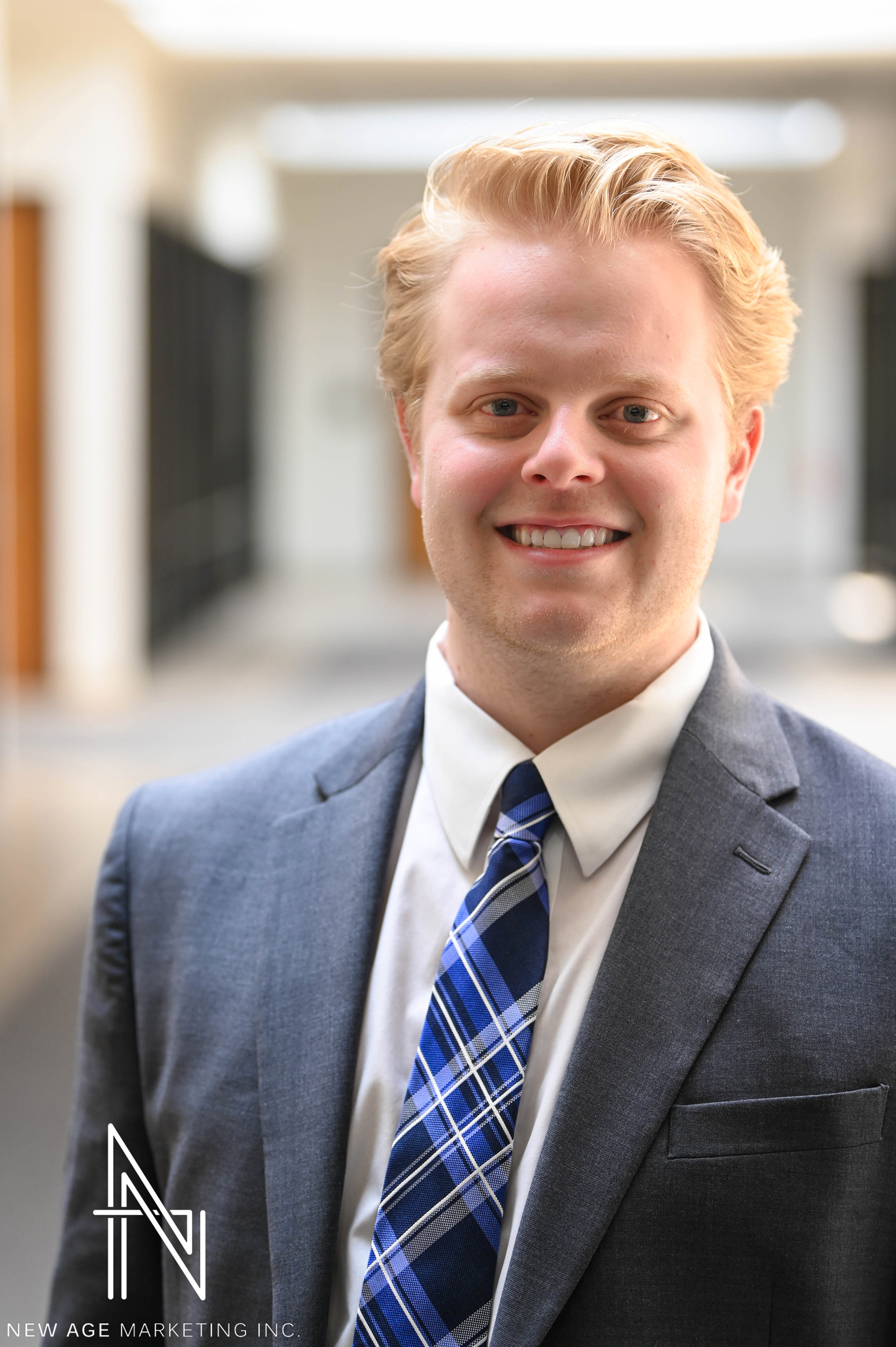 A headshot for an employee of New Age Marketing