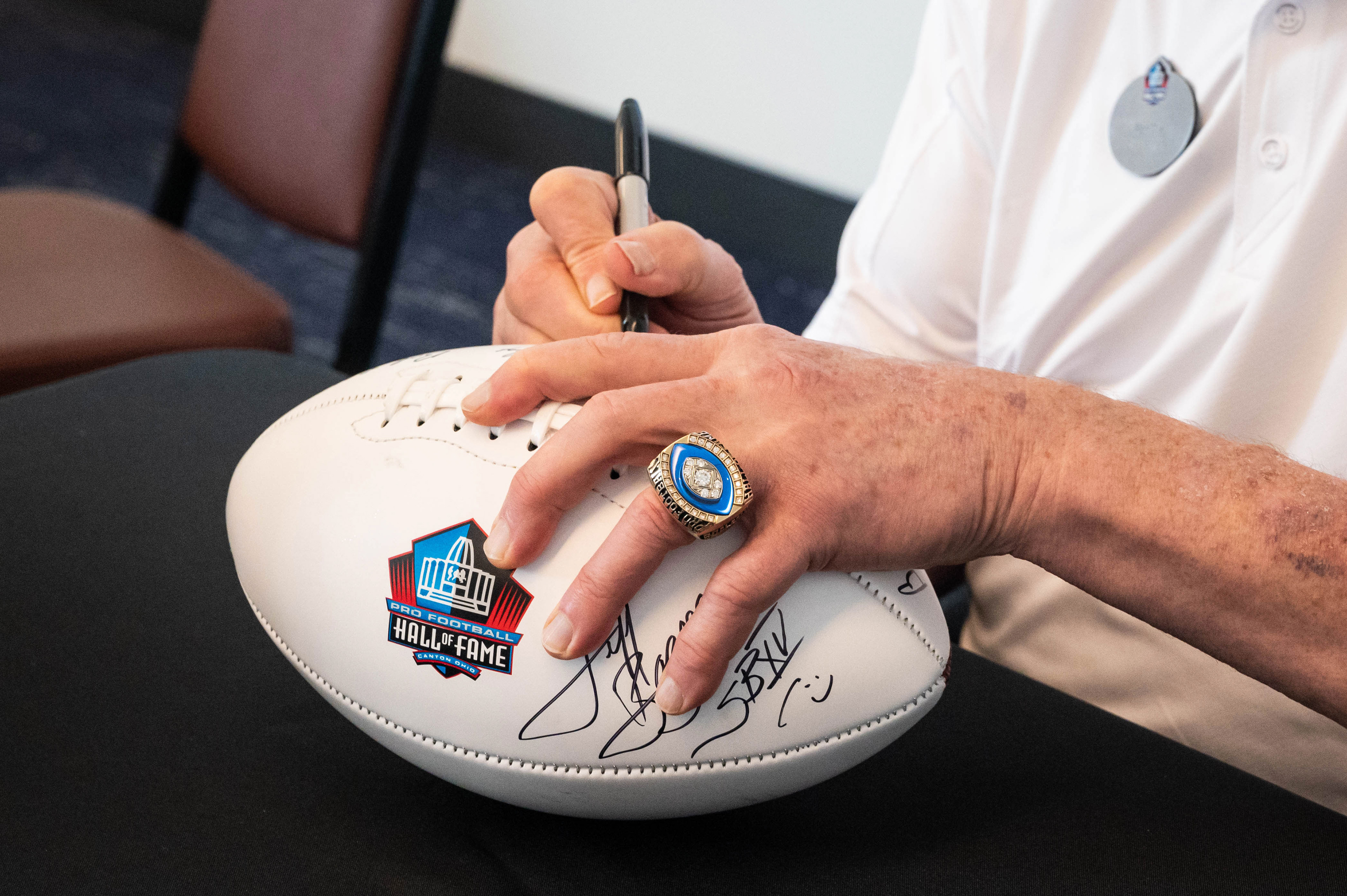 Hall of Famers signing autographs
