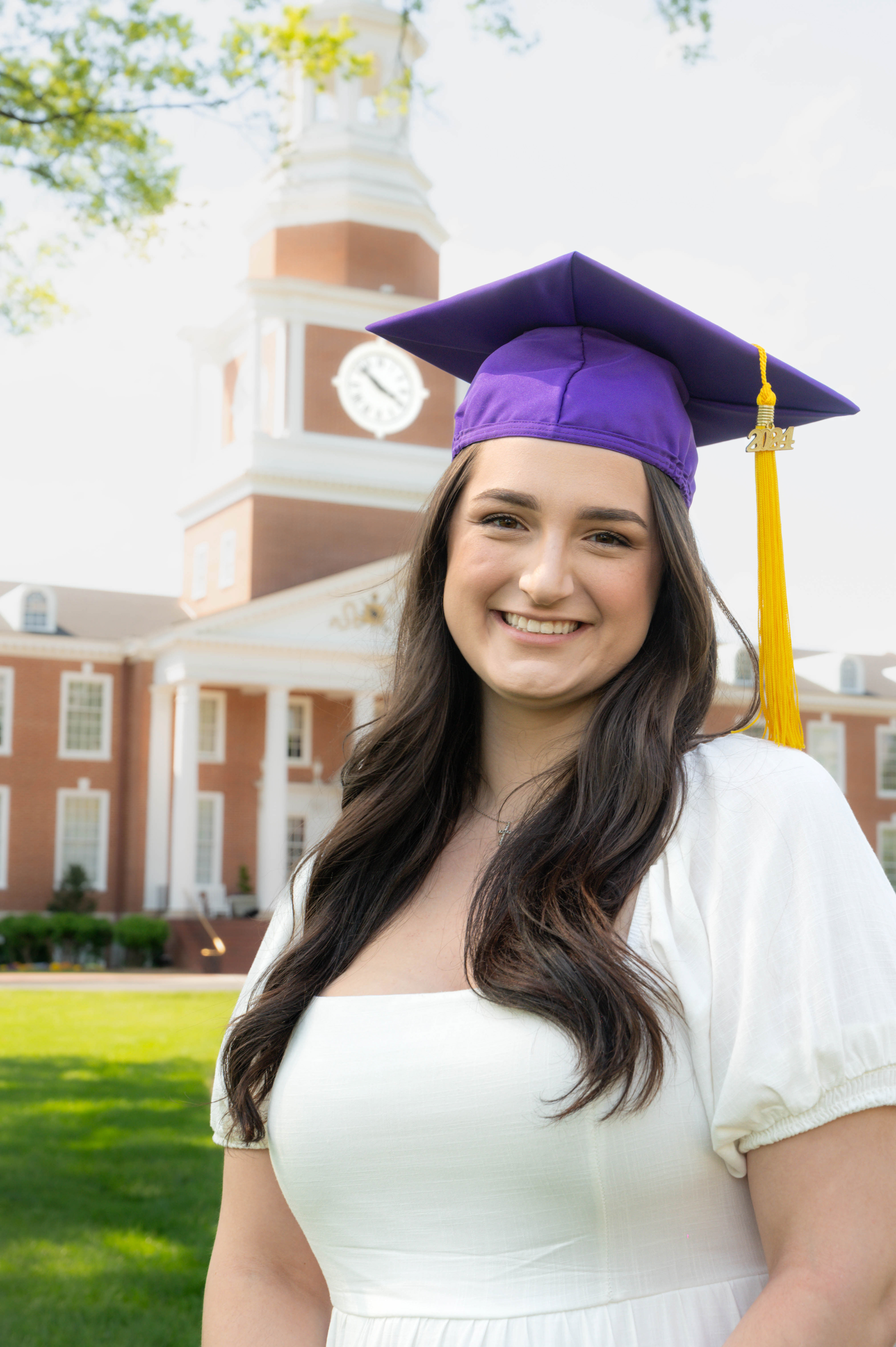 Soft image of a girl wearing a 2024 cap