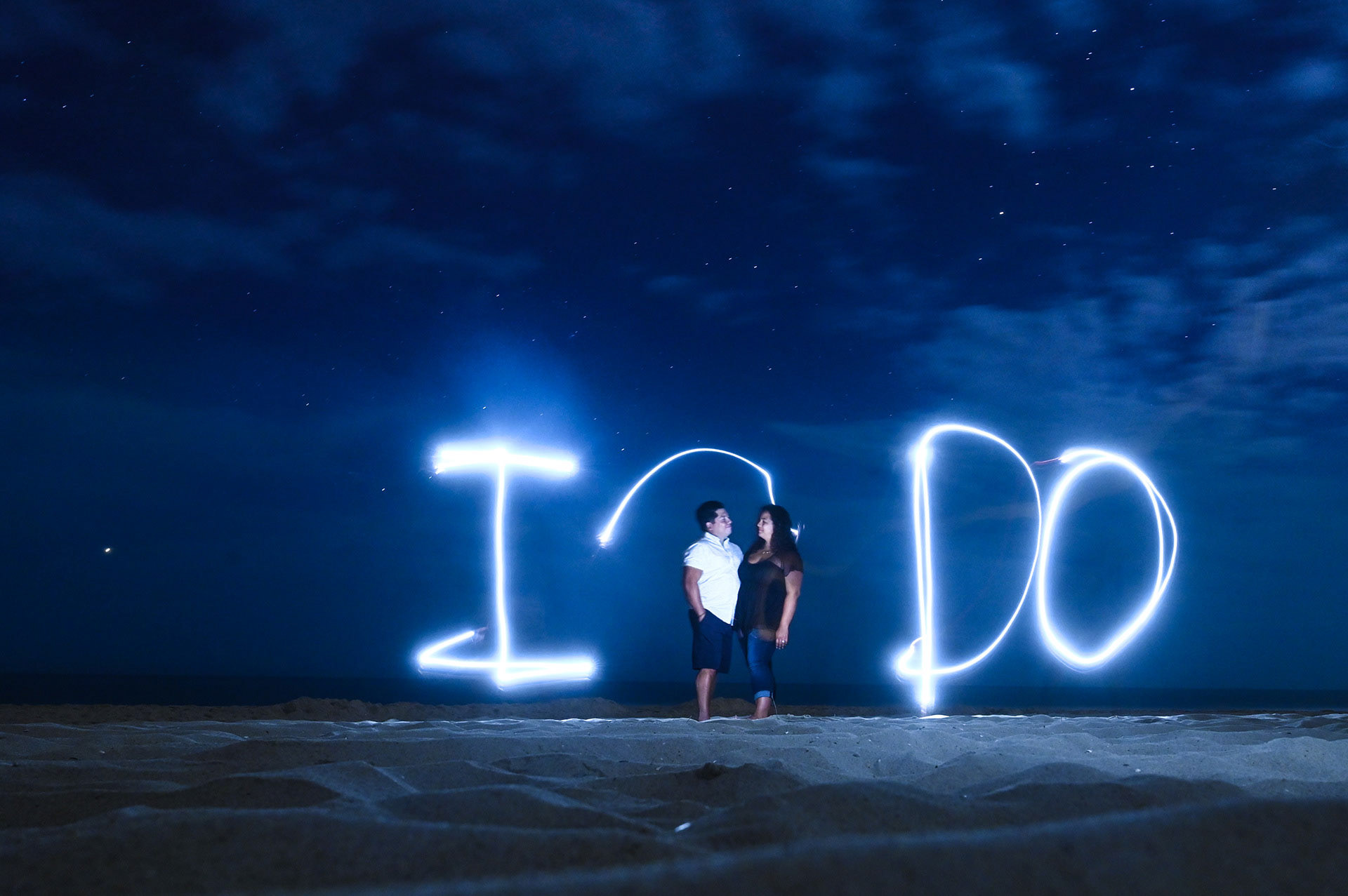 An engagement shoot spelling out I Do