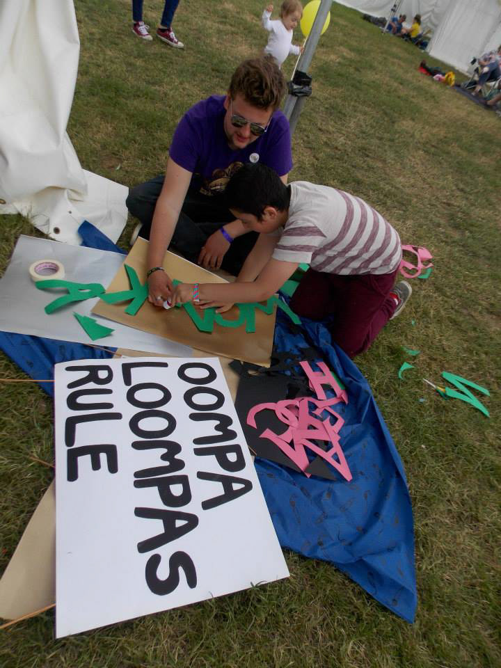 Sign making at Wychwood Festival