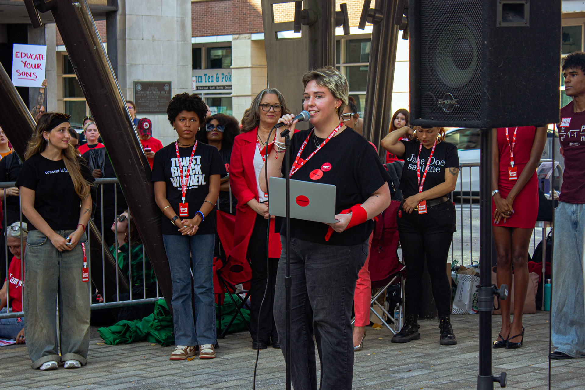 Finley Muratova, organizer of the rally & sexual assault prevention specialist, speaking to the audience.