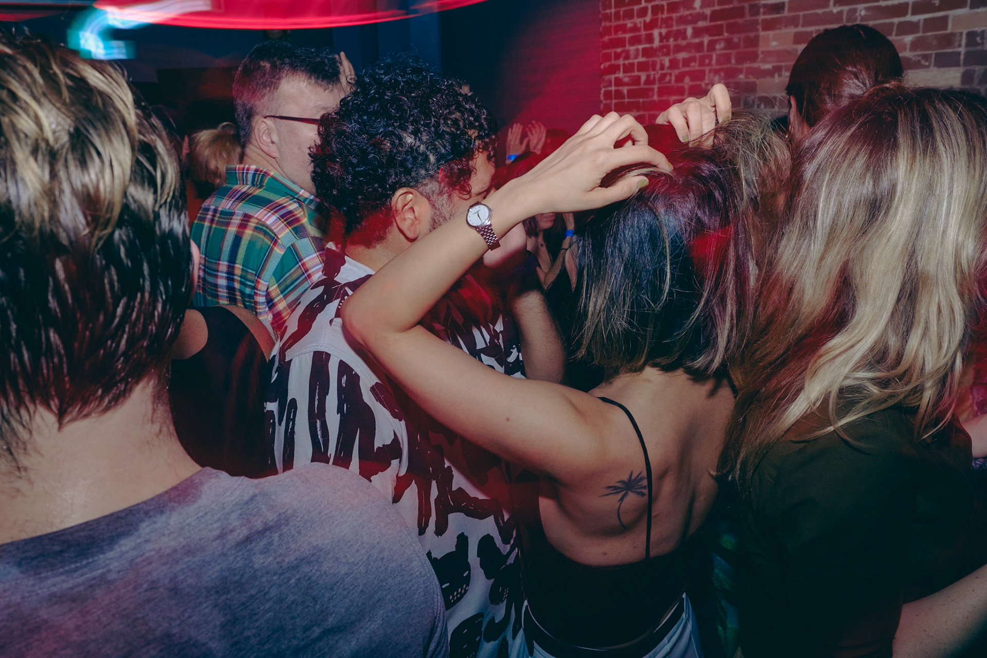 Explore Toronto’s nightlife through close-up shots and the glow of drag flash effects at Rumba Buena’s unforgettable party scene.