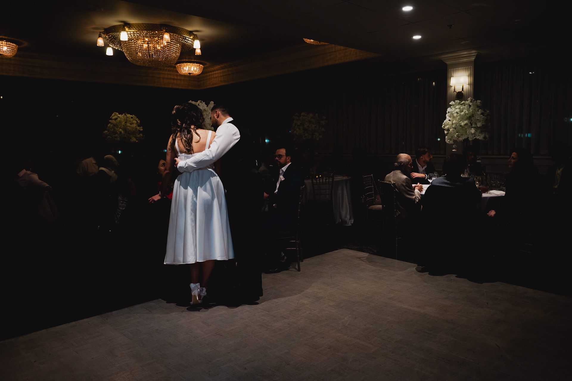 Bride delivering a heartfelt speech to guests during an elegant Toronto engagement reception