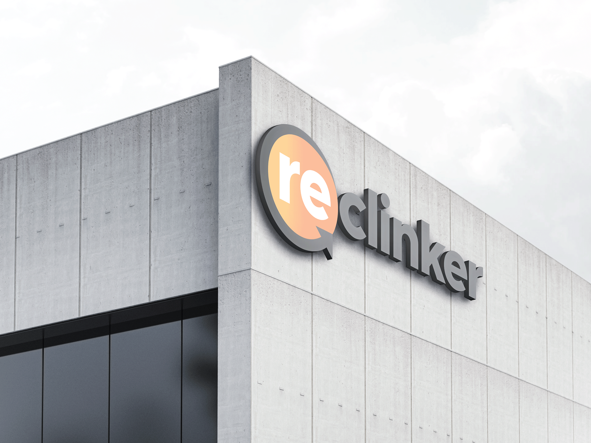 A mock-up of a cement building with a sign showing the logo of Reclinker