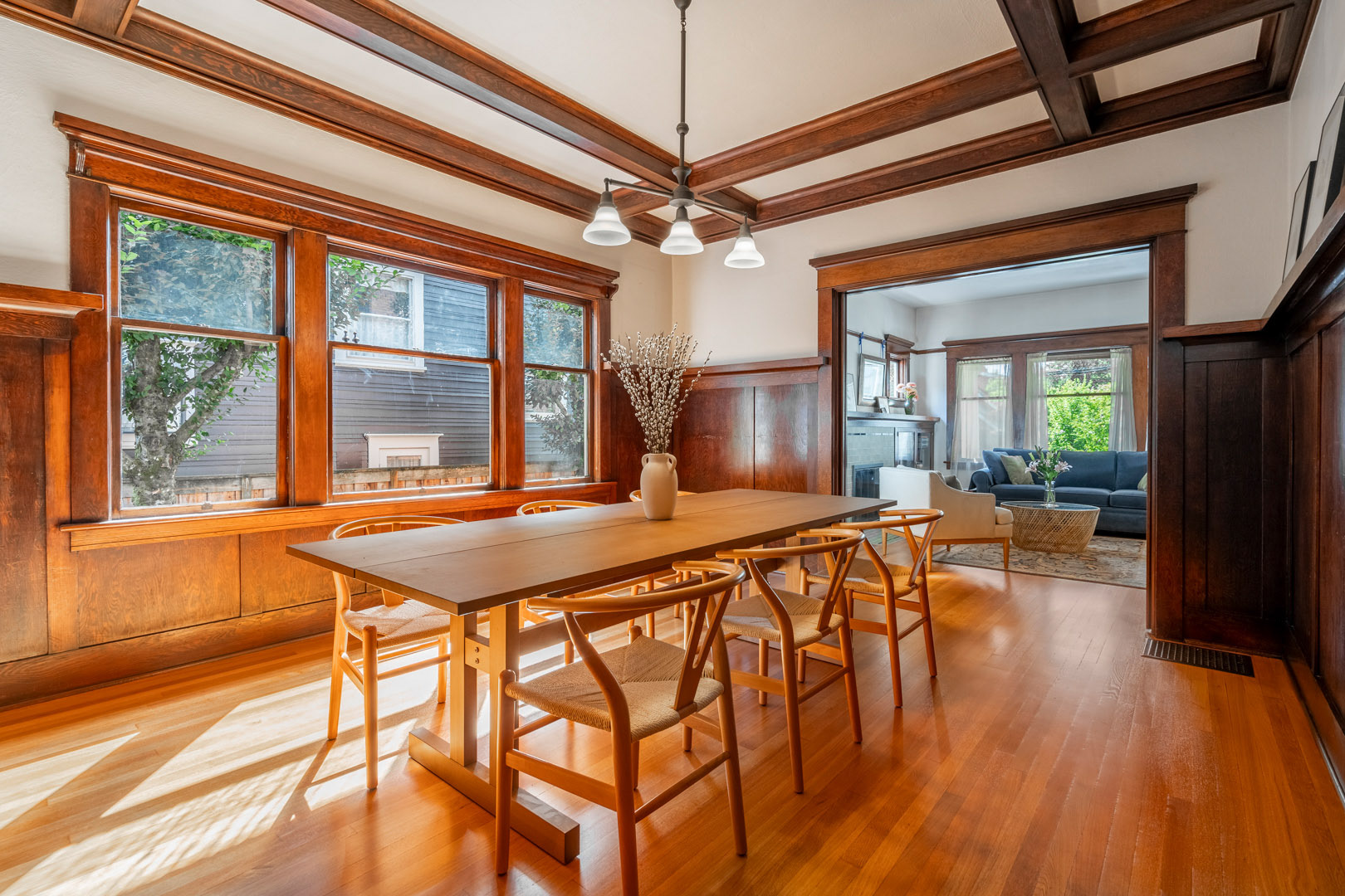 Stunning dining room with warm wood tones and natural light—perfectly captured for maximum charm.