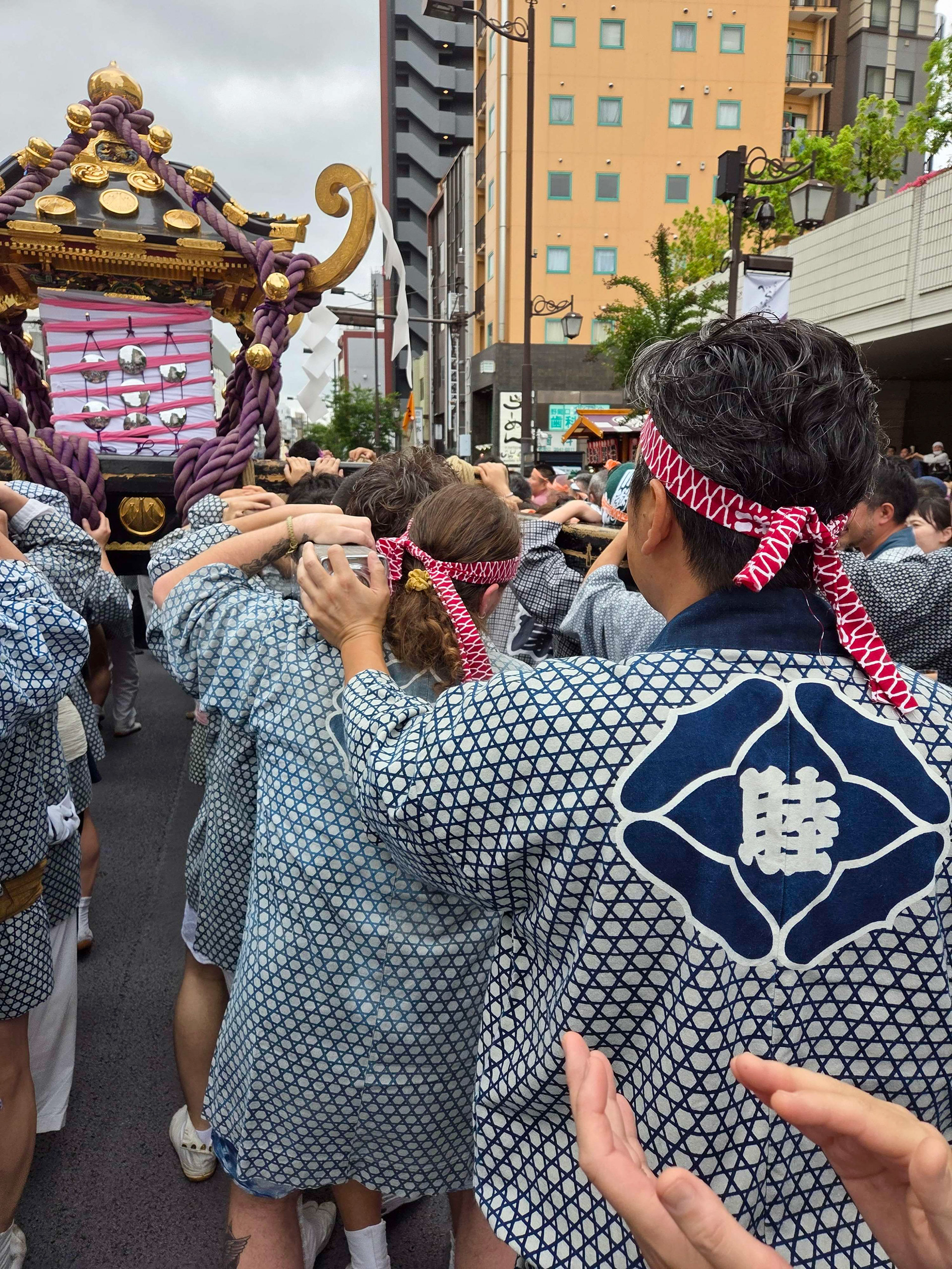 Participating in the Sunday morning mikoshi procession at Sanja Matsuri. I'm ahead of the participant nearest the camera, marked by my yellow hair tie.