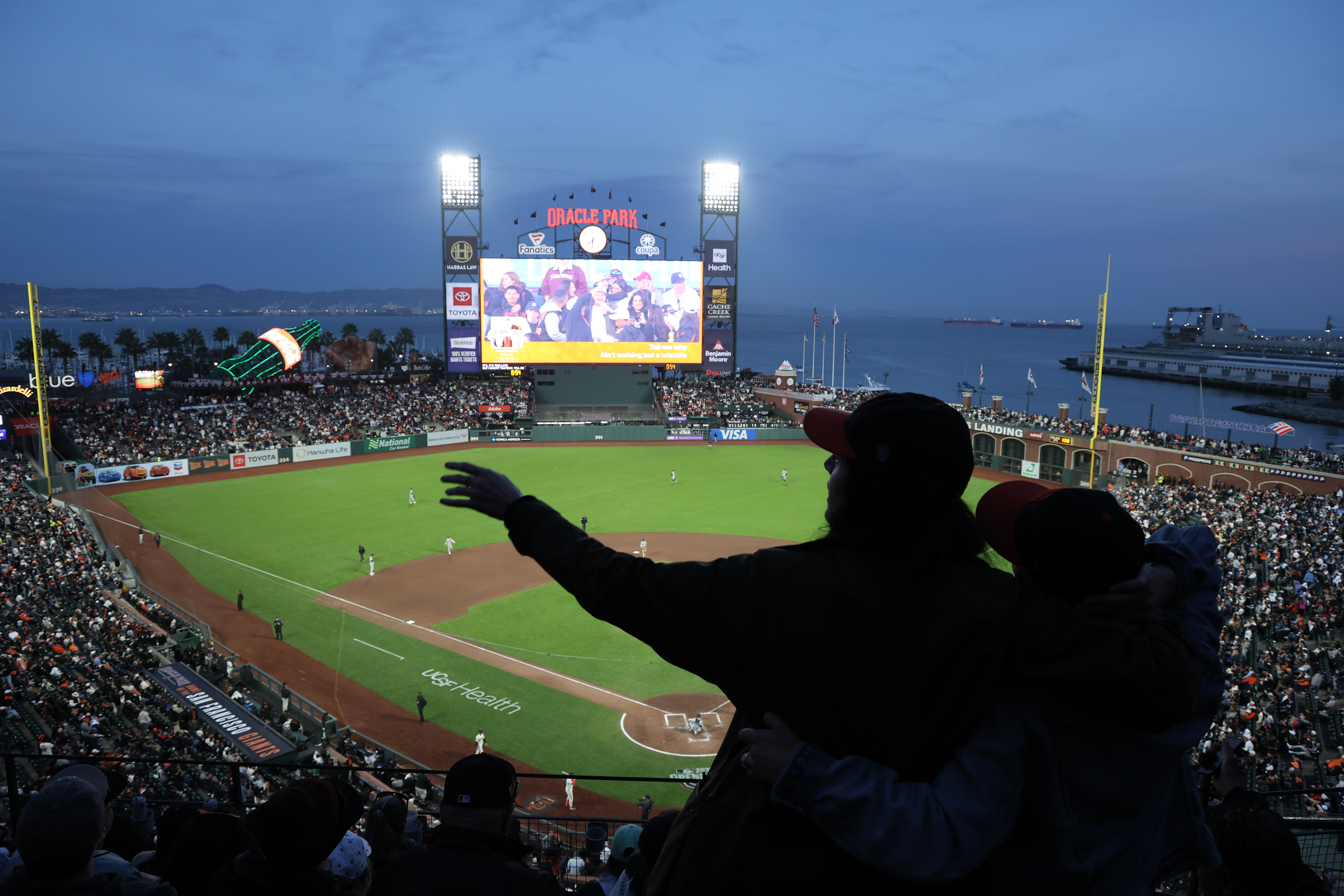 Giants fans sing along to the jams at Oracle Park on Opening Night on March 25, 2026. Photo by Klyde Java.