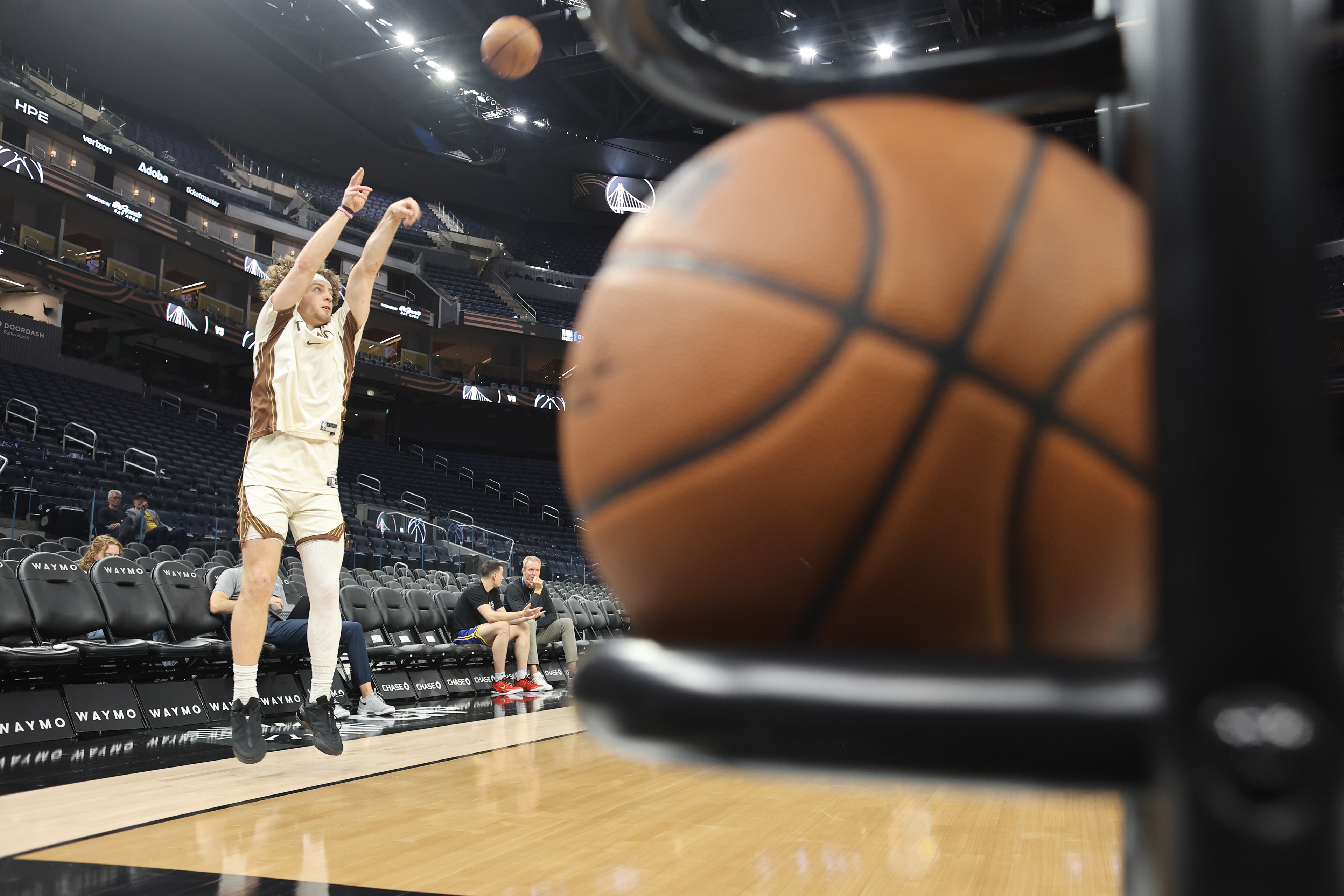 Warriors Guard Brandin Podziemski warms up his shot before a game against the Washington Wizards on March 27, 2026. Photo by Klyde Java.