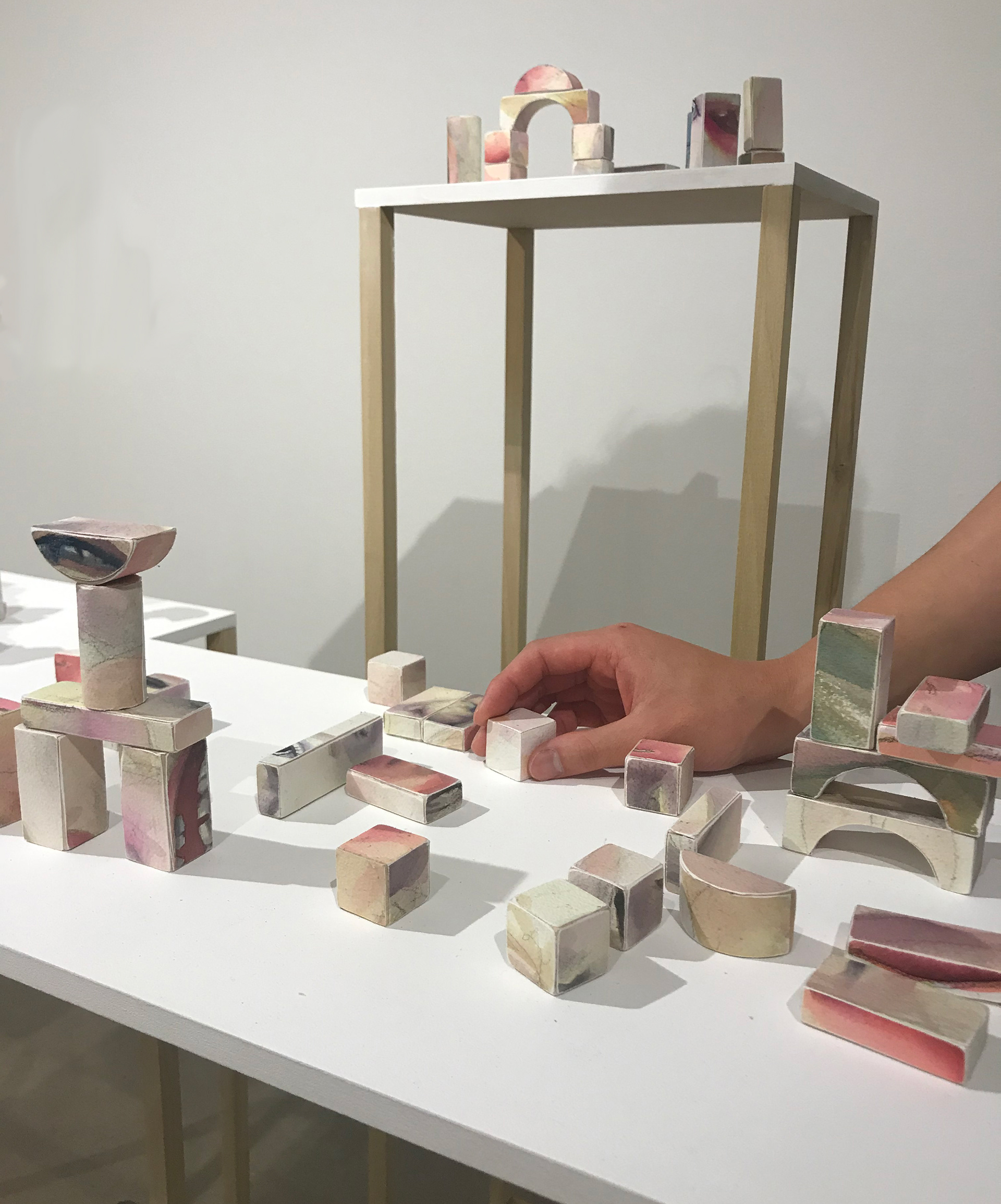 Superstructure, watercolor, pine, dimensions vary, 2020. Interactive block toy