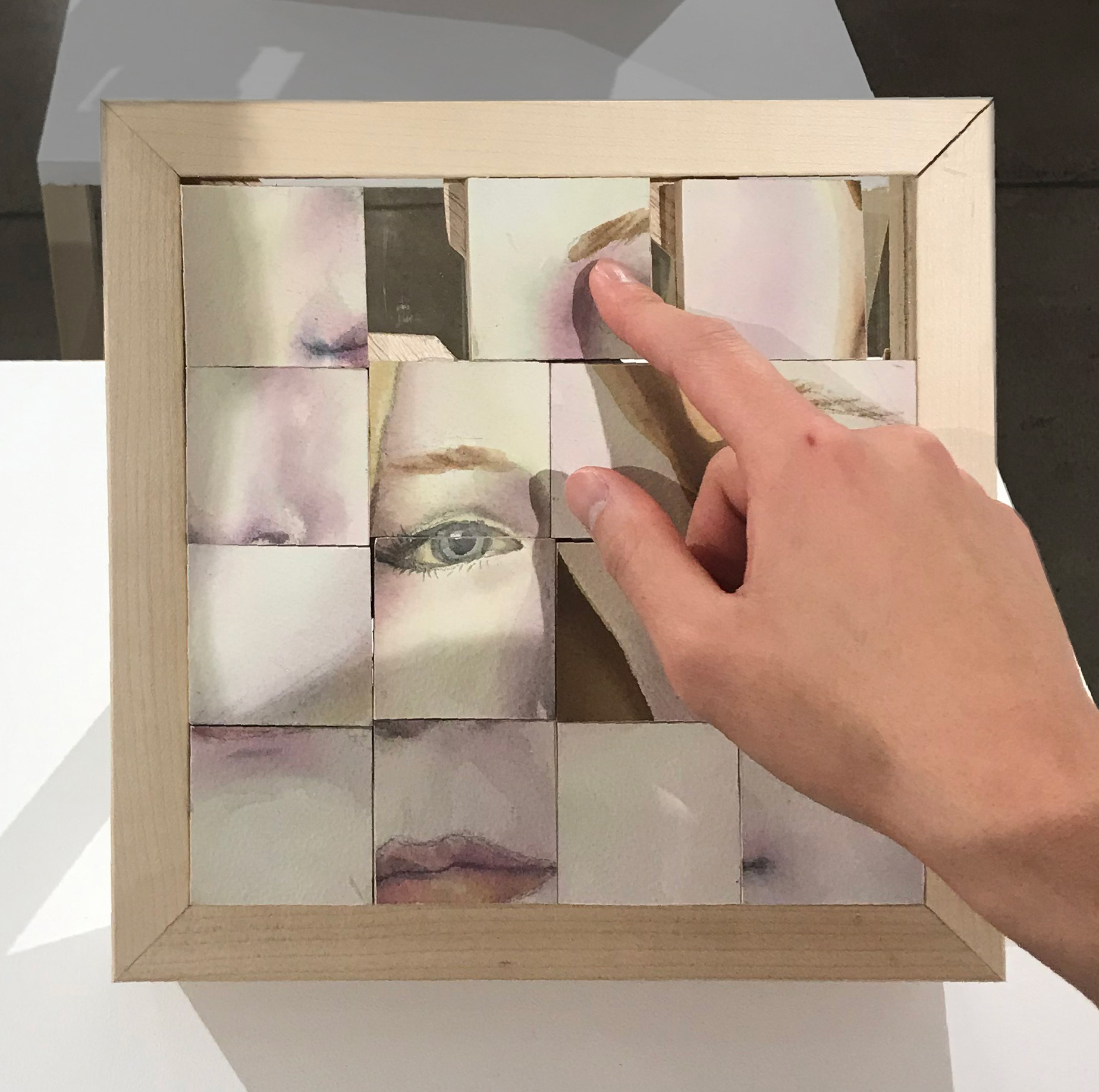 I, watercolor, pine, 9" x 9" x 4", 2020. Interactive puzzle game.