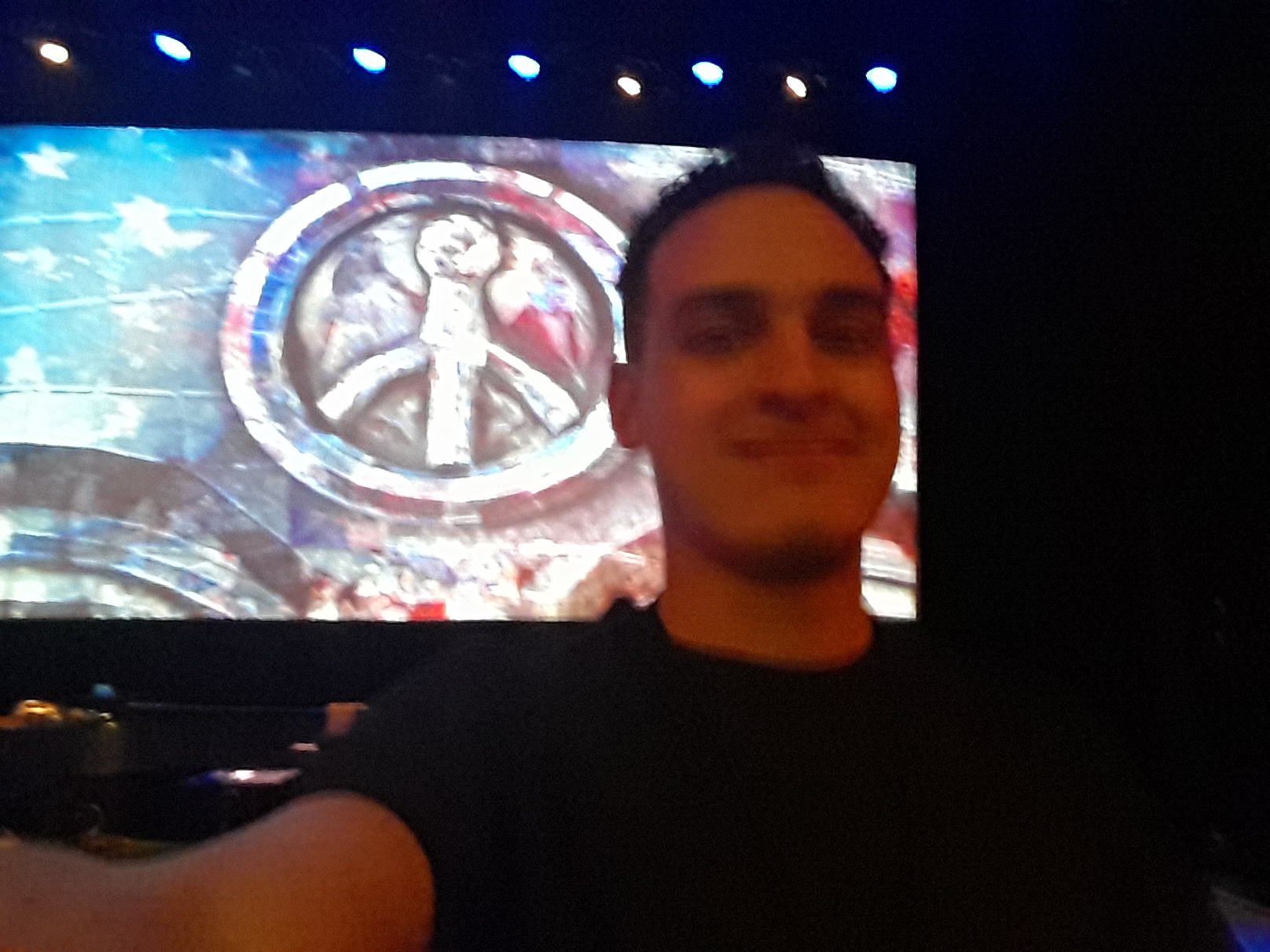 Me in front of the sculpture being projected.