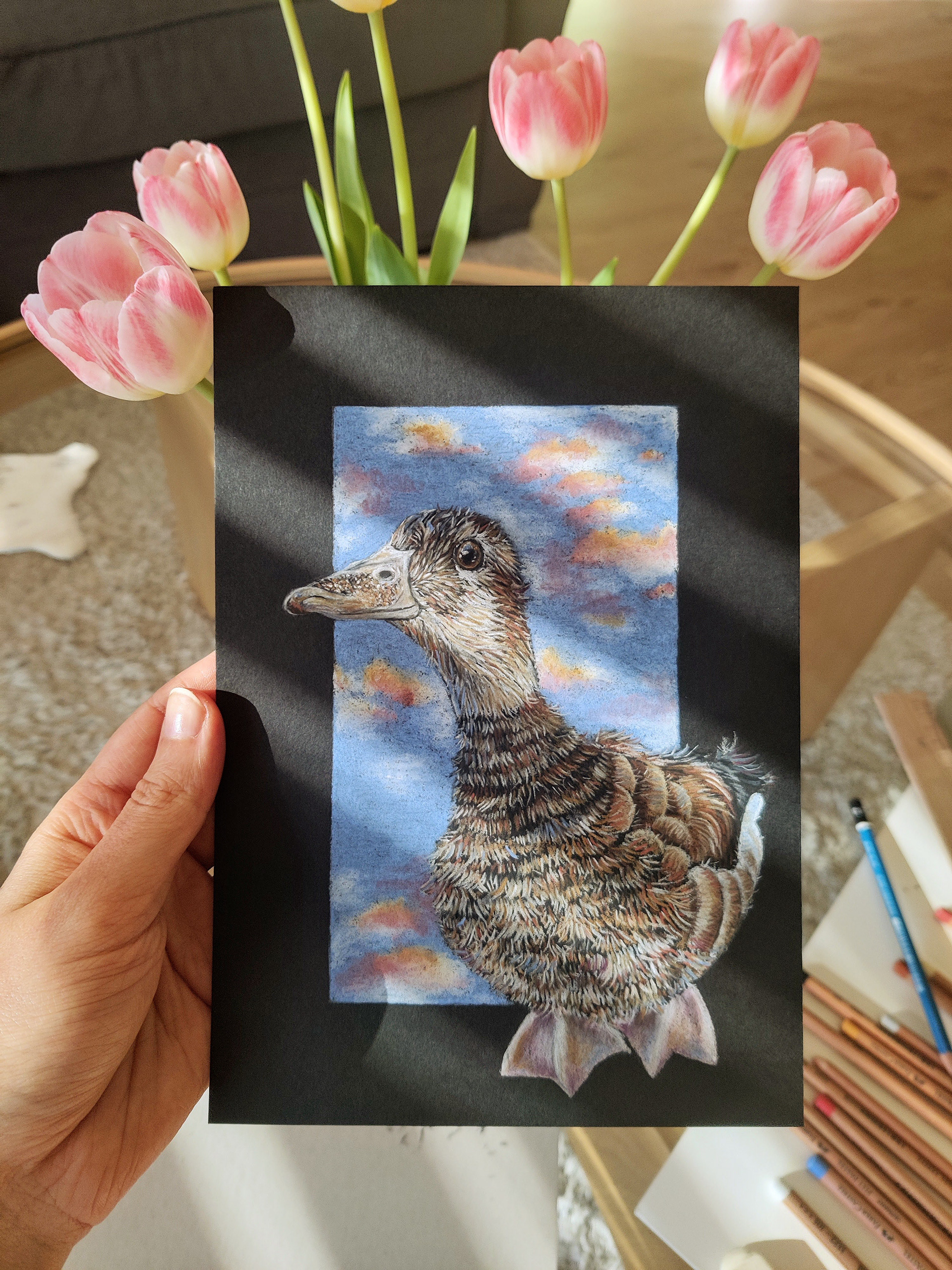A duck in the clouds on A5 black paper