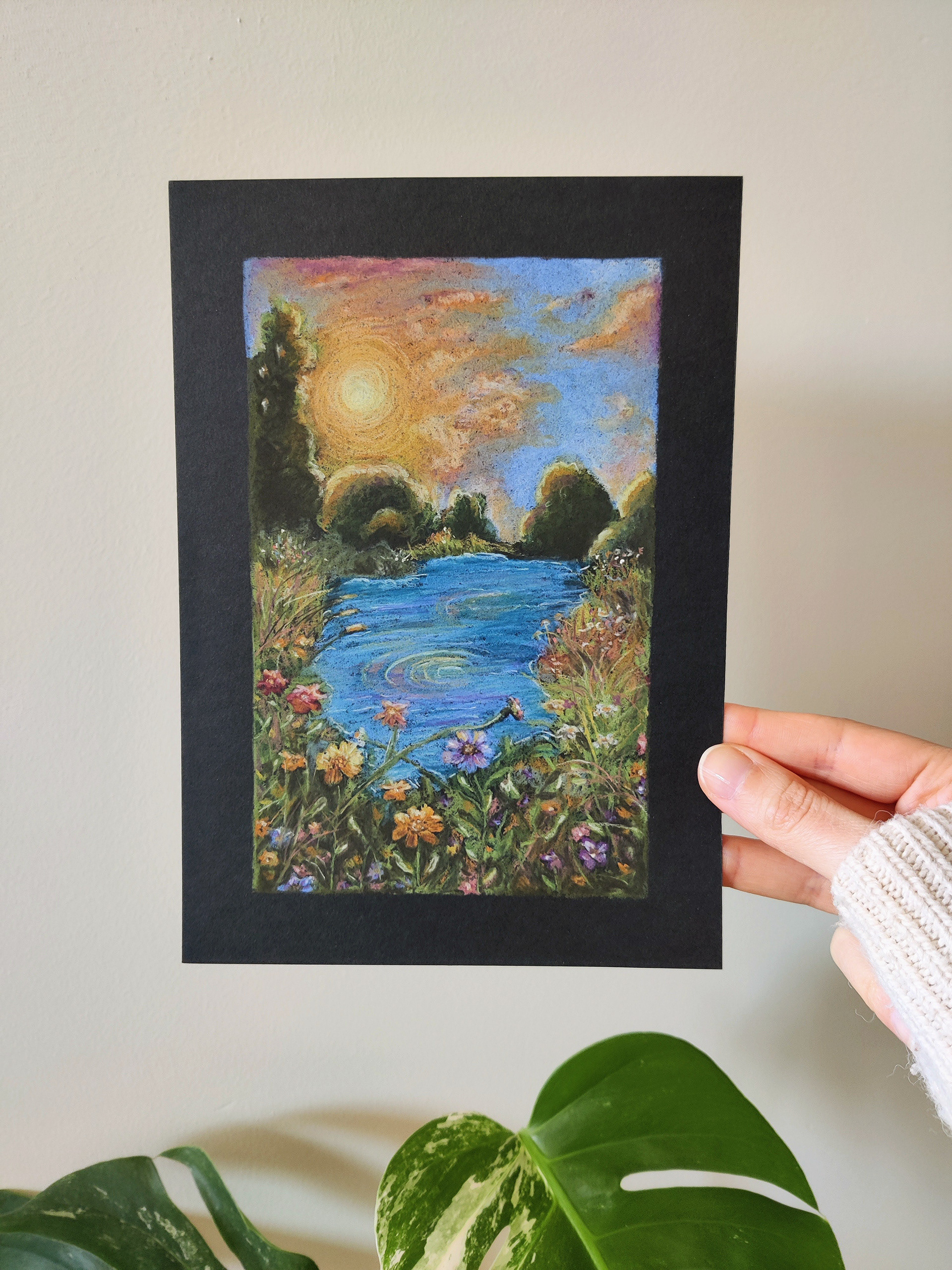 A pond with flowers on A5 black paper