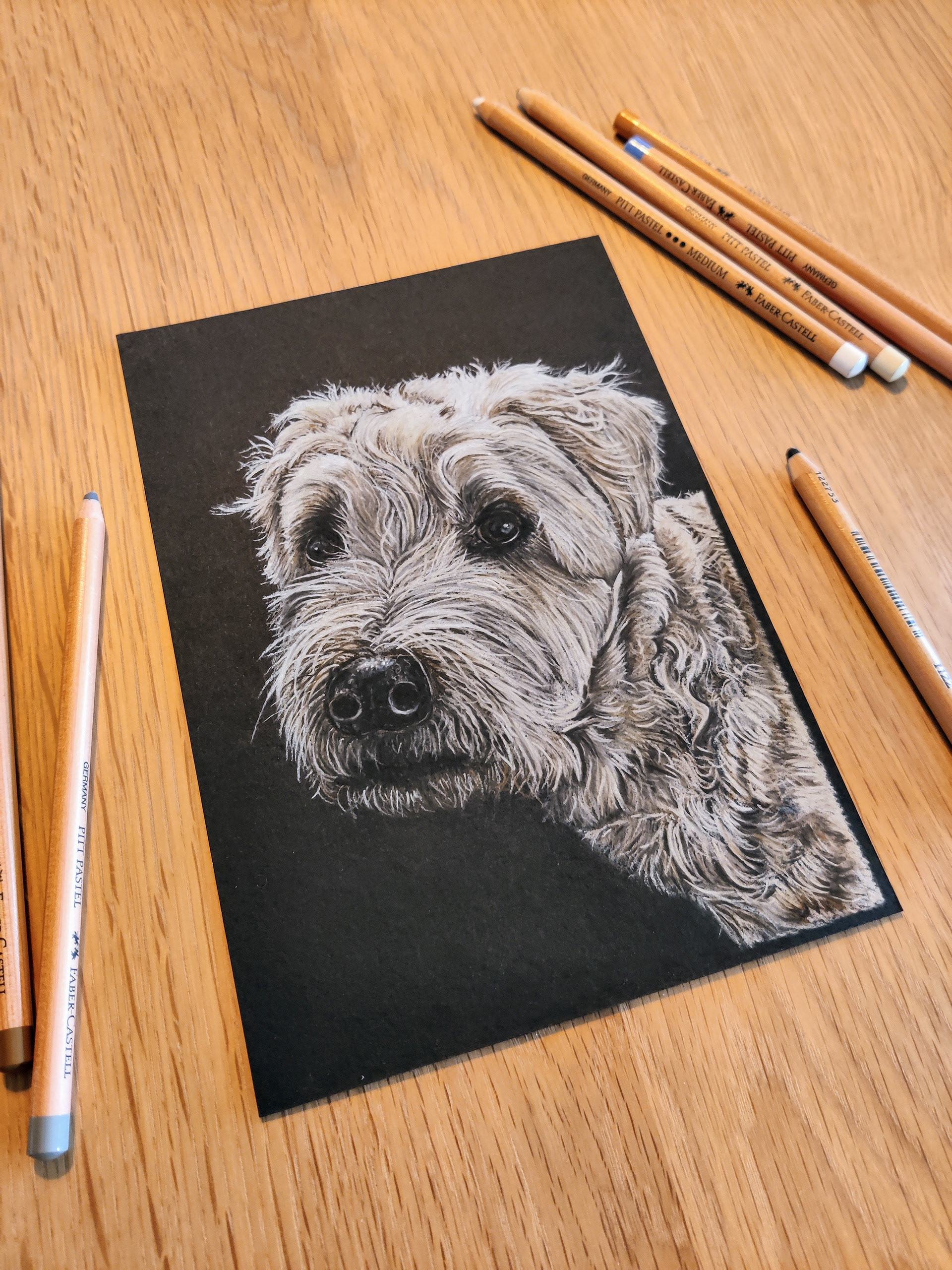 A dog mix on A5 black paper