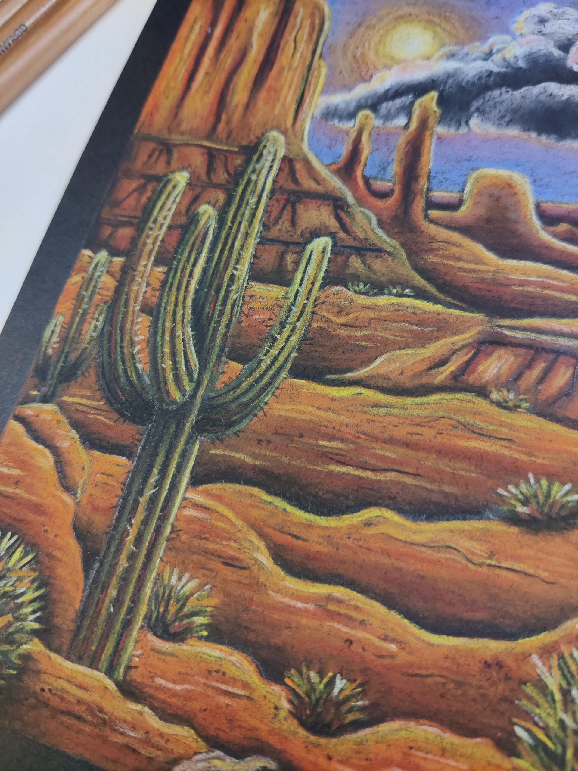 Monument valley USA on A5 black paper: close up