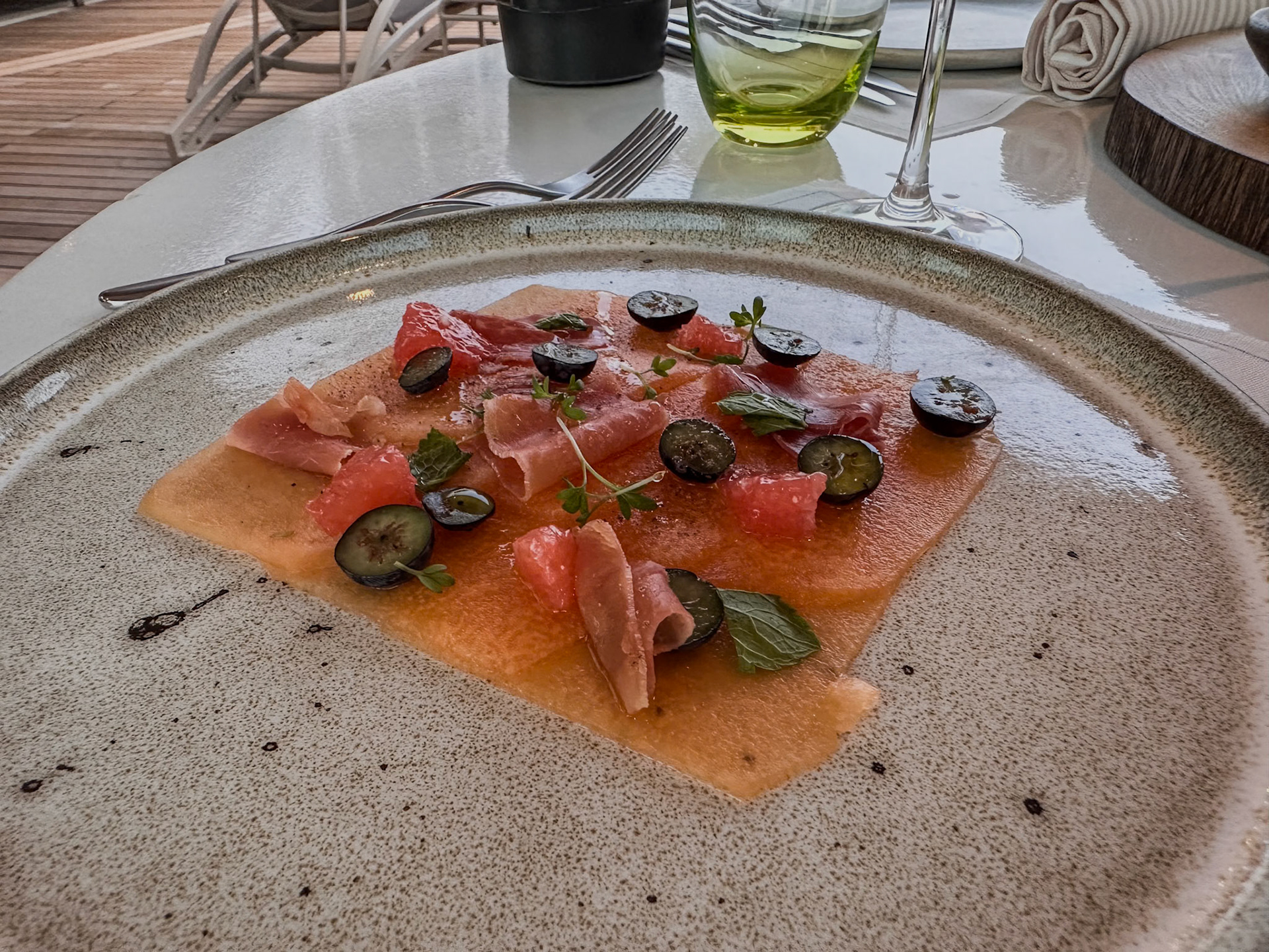 Cantaloupe, prosciutto, grapefruit, mint,  sliced blueberries , black pepper