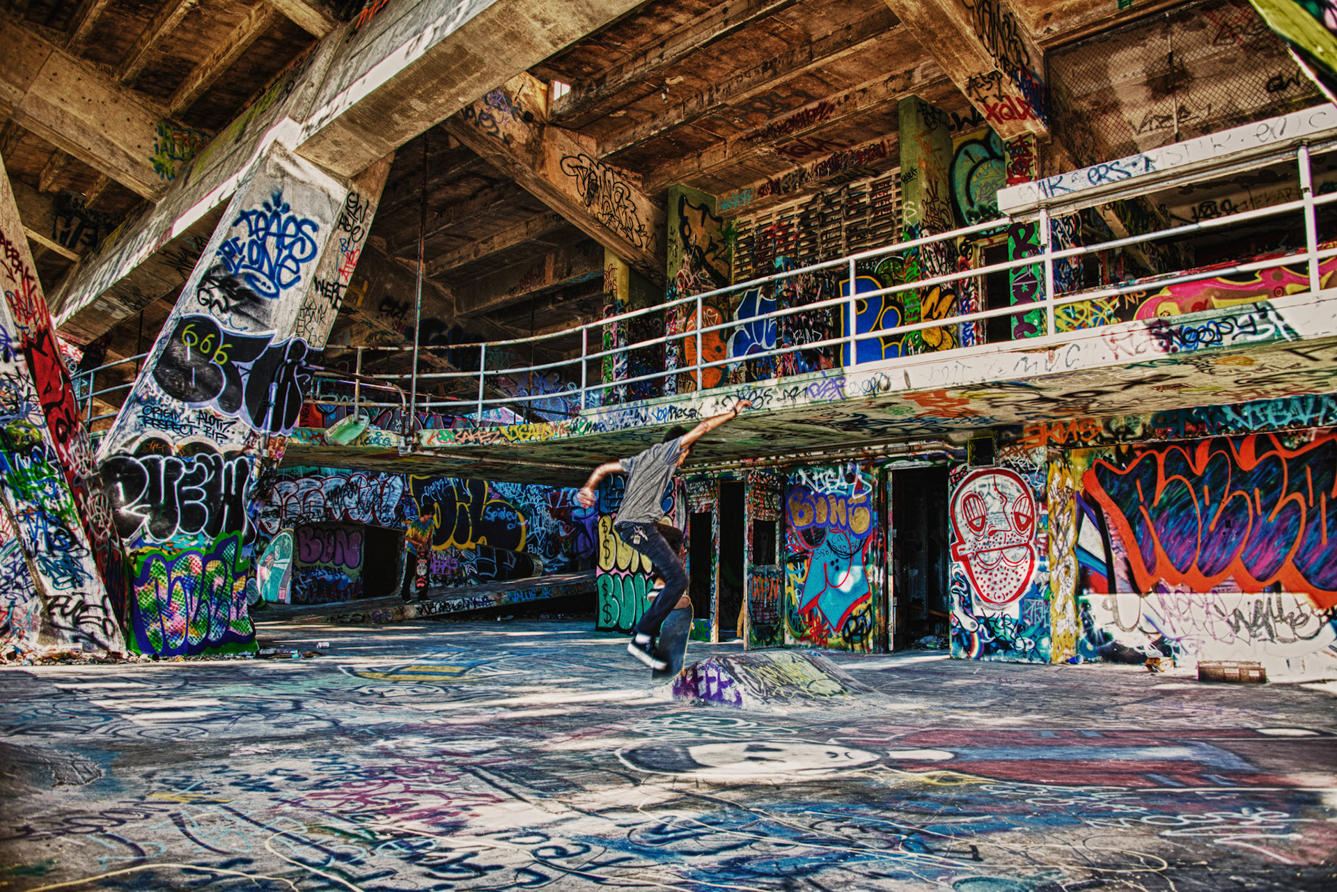 The Miami Marine Stadium was completed in 1963. It served as a venue for powerboat races, concerts and sporting events. It was frequented by the likes of Sammy Davis Jr and Richard Nixon. In the wake of hurricane Andrew it was condemed in 1992. It has become a haven for skateboarders and graffiti artists. I was amazed by the artwork contrasted by the garbage. As you walk into this monolith, you are greeted by the smell of fresh spray paint.