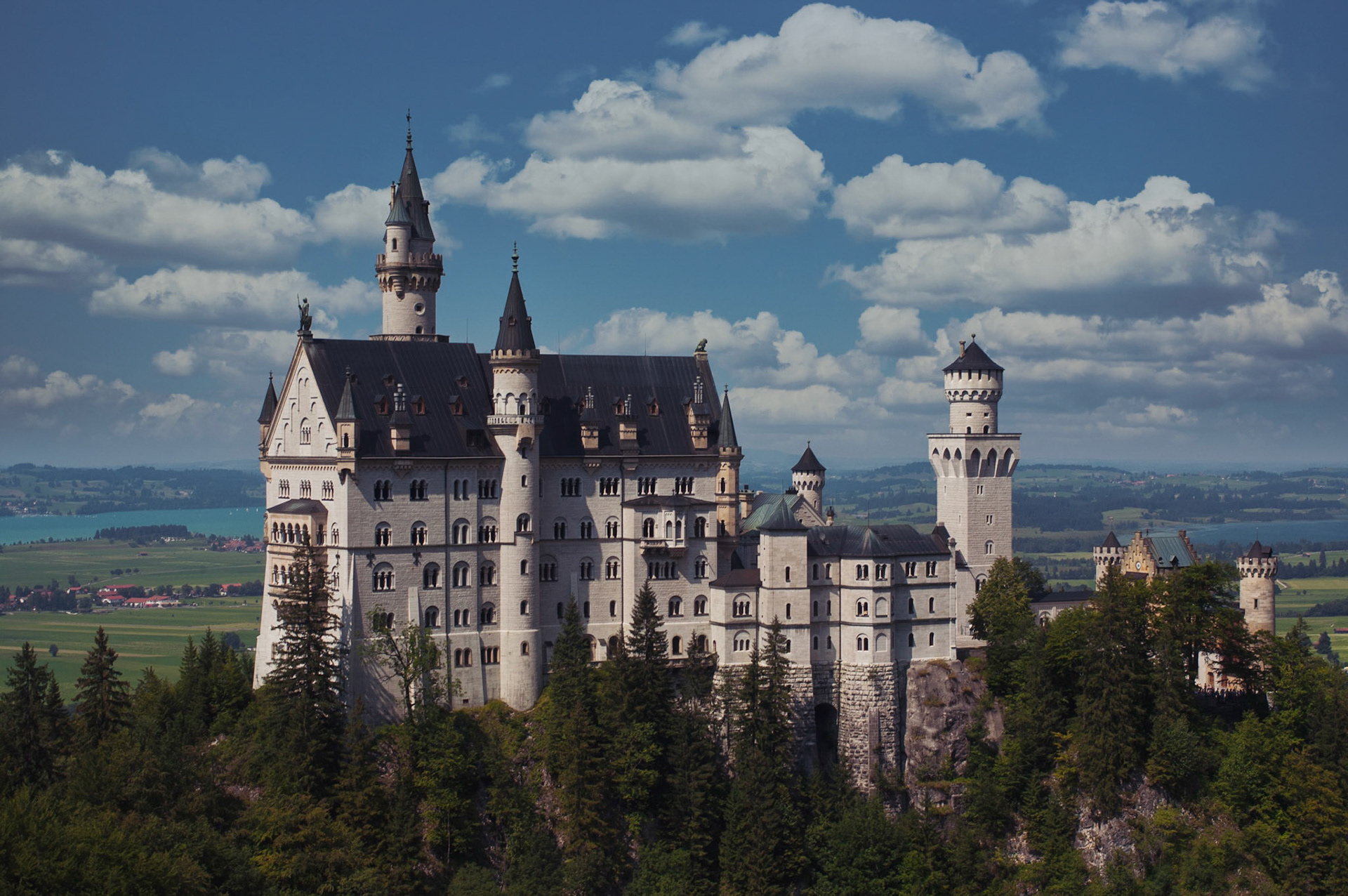 Neuschwanstein Castle is a nineteenth-century Romanesque Revival palace on a rugged hill above the village of Hohenschwangau near Füssen in southwest Bavaria, Germany.