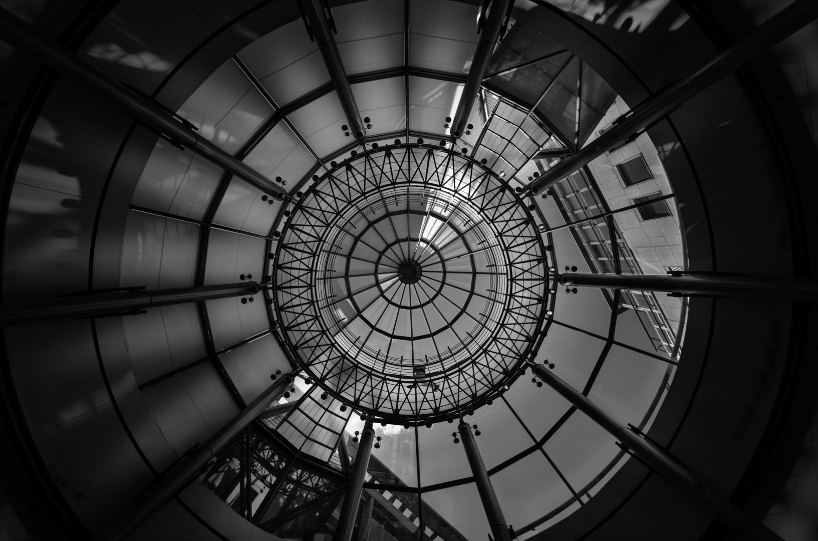 Industrial Eye — Circular glass dome revealing mechanical beauty, Hamburg