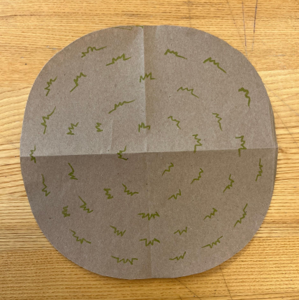 Paper floor depicting grass.