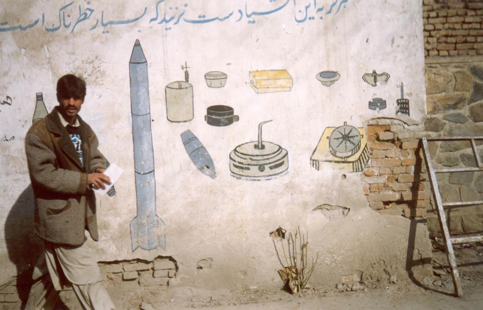 Nabiela, 'Warnings are painted on the walls to tell people to take care of mines…' from the PhotoVoice project 'Shooting Kabul', Afghanistan, 2002 © Nabiela / PhotoVoice / Aschiana