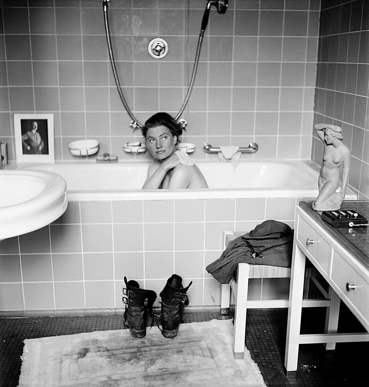 Lee Miller in Hitler’s bathtub, 1945. Photograph by Lee Miller with David E. Scherman © Lee Miller Archives