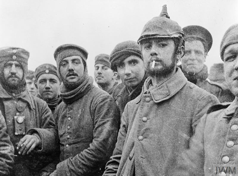 Private R. W. Turner (attrib.), British and German soldiers fraternizing at Ploegsteert, Belgium, on Christmas Day, 1914 © Imperial War Museums