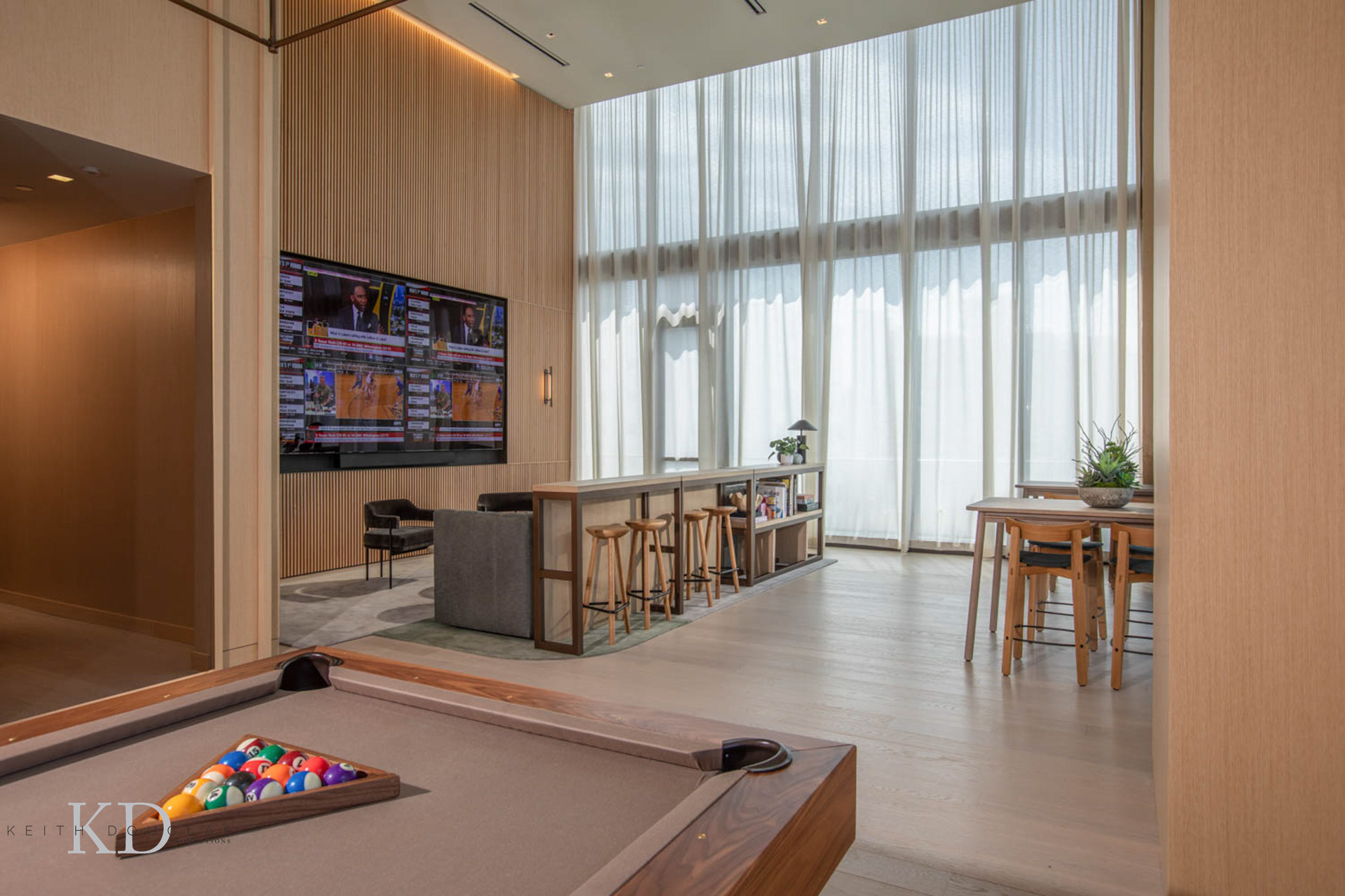 Luxury units with floor-to-ceiling windows and natural light