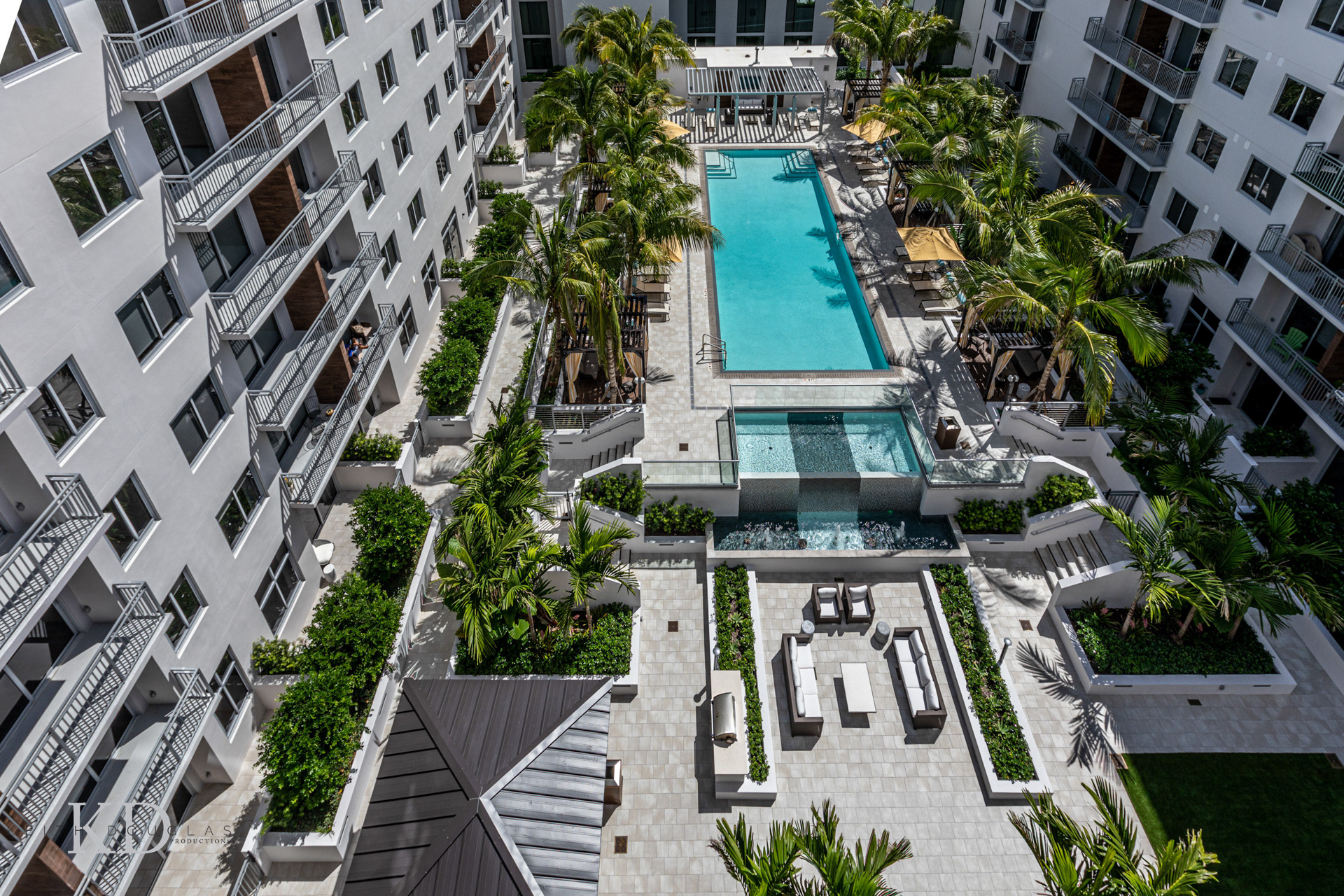 Urban oasis pool side WPB Modern apartments with resort-style pool and cabanas