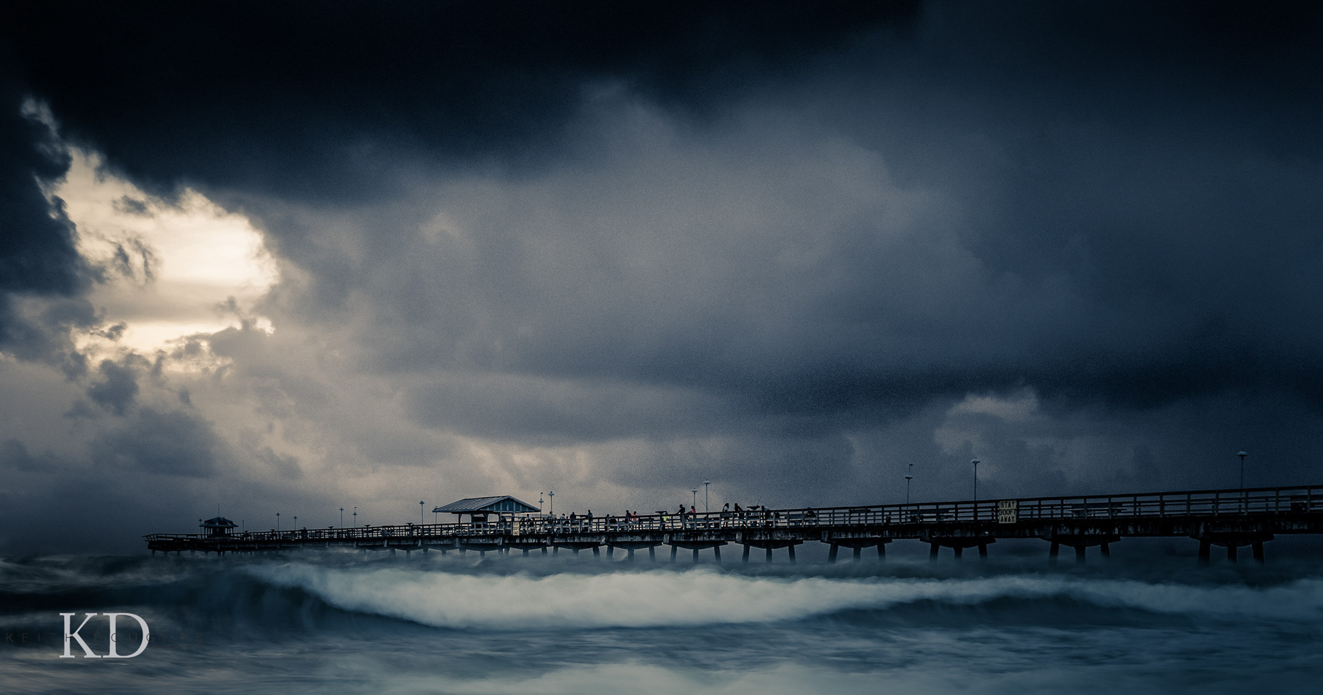 Travel & hospitality imagery Commerical pier during a mourning stome