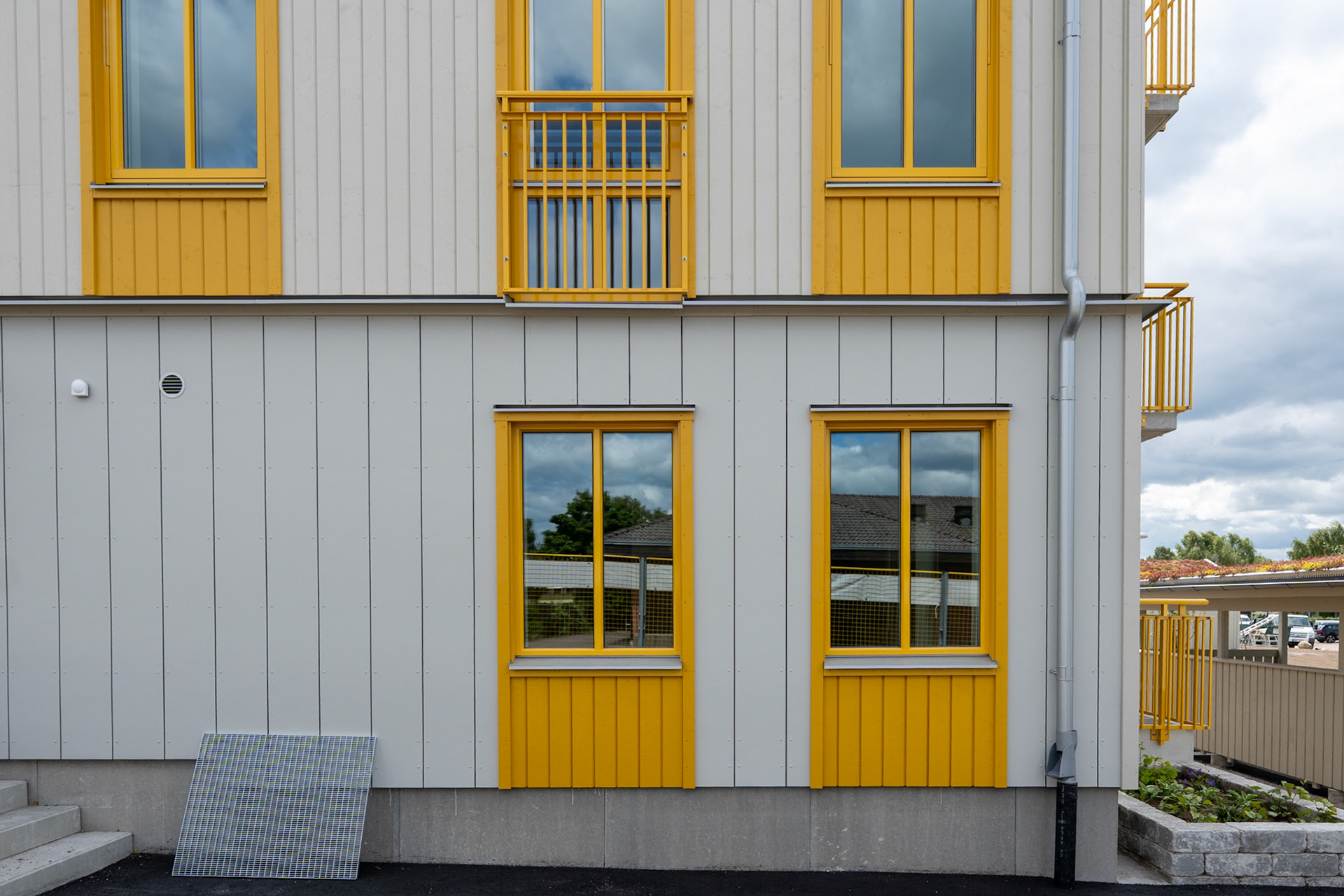 Hardie Panel. Flerbostadshus, Färjestaden.