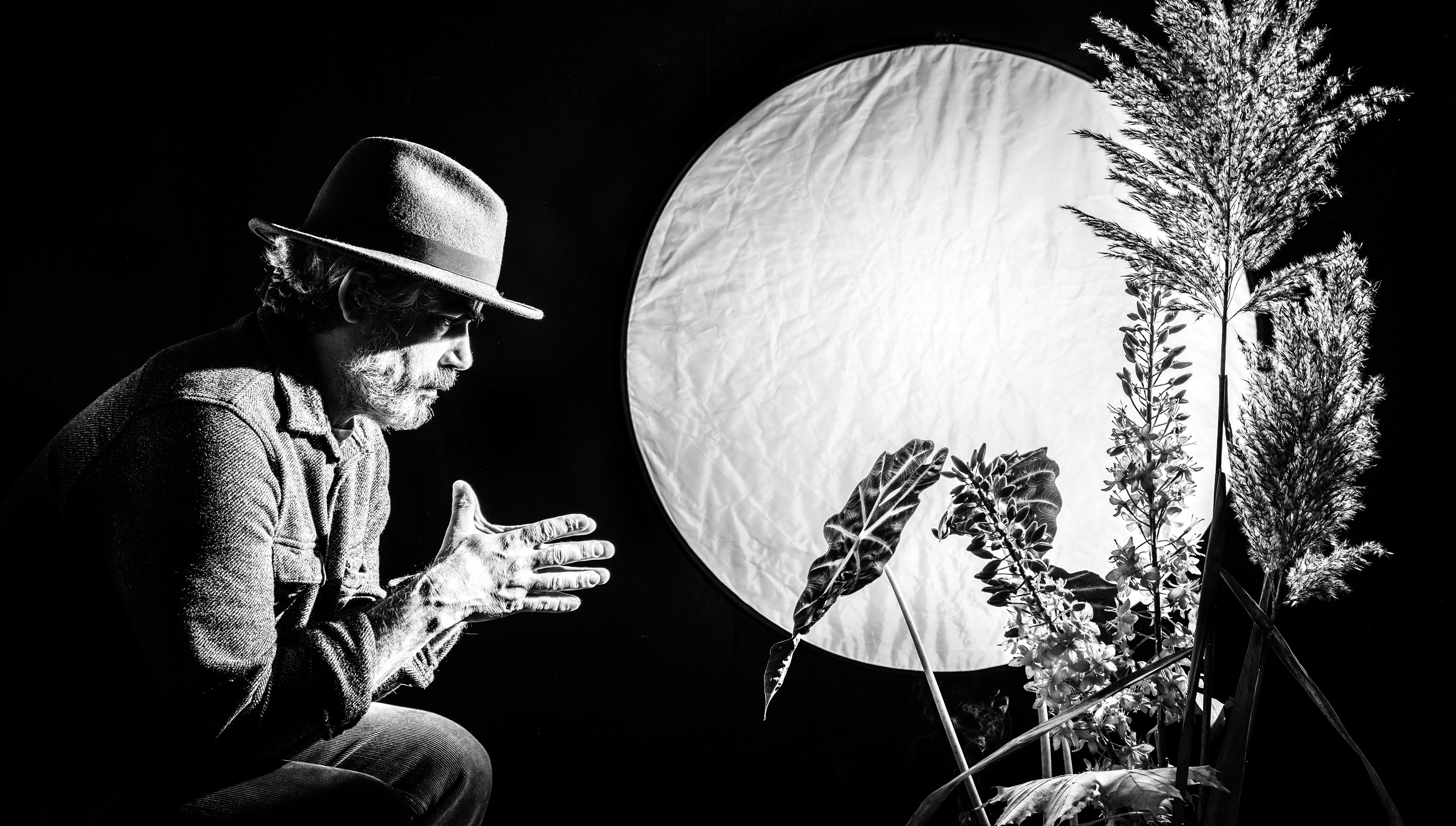 Self portrait as man sitting under a full moon and a mind full of thoughts.