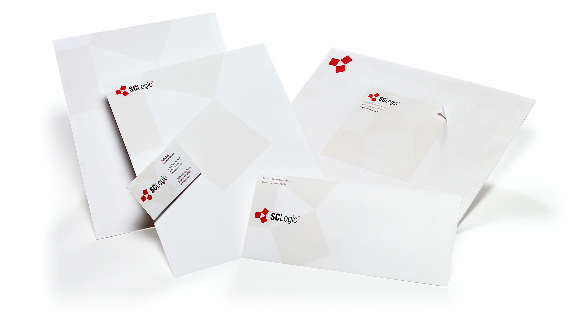 Supply Chain Logic corporate identity system with logo, stationery, business cards, envelopes, labels, and presentation folder.